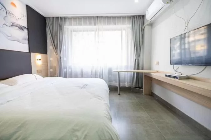 Bed in Shenzhen Hualian Boutique Hotel