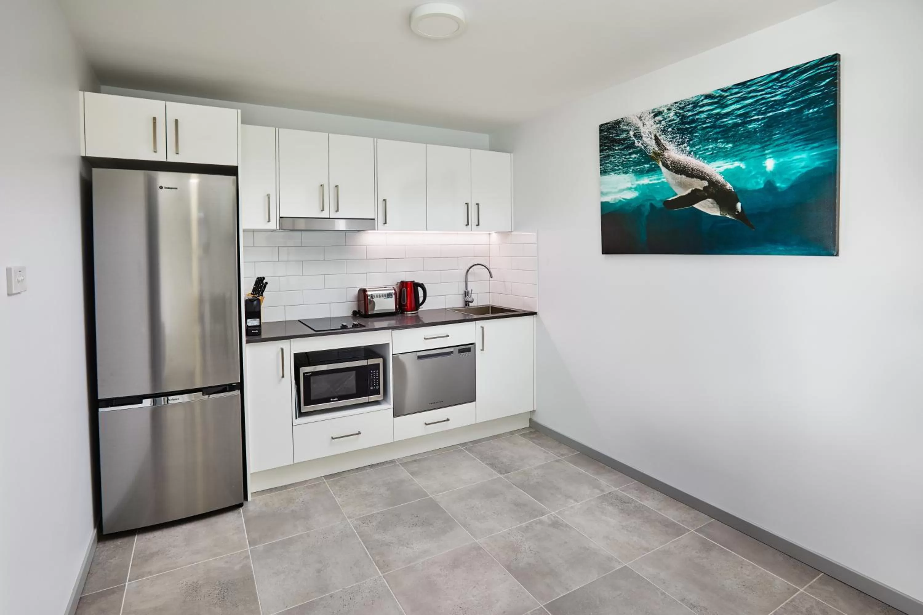 Kitchen or kitchenette in East Maitland Executive Apartments