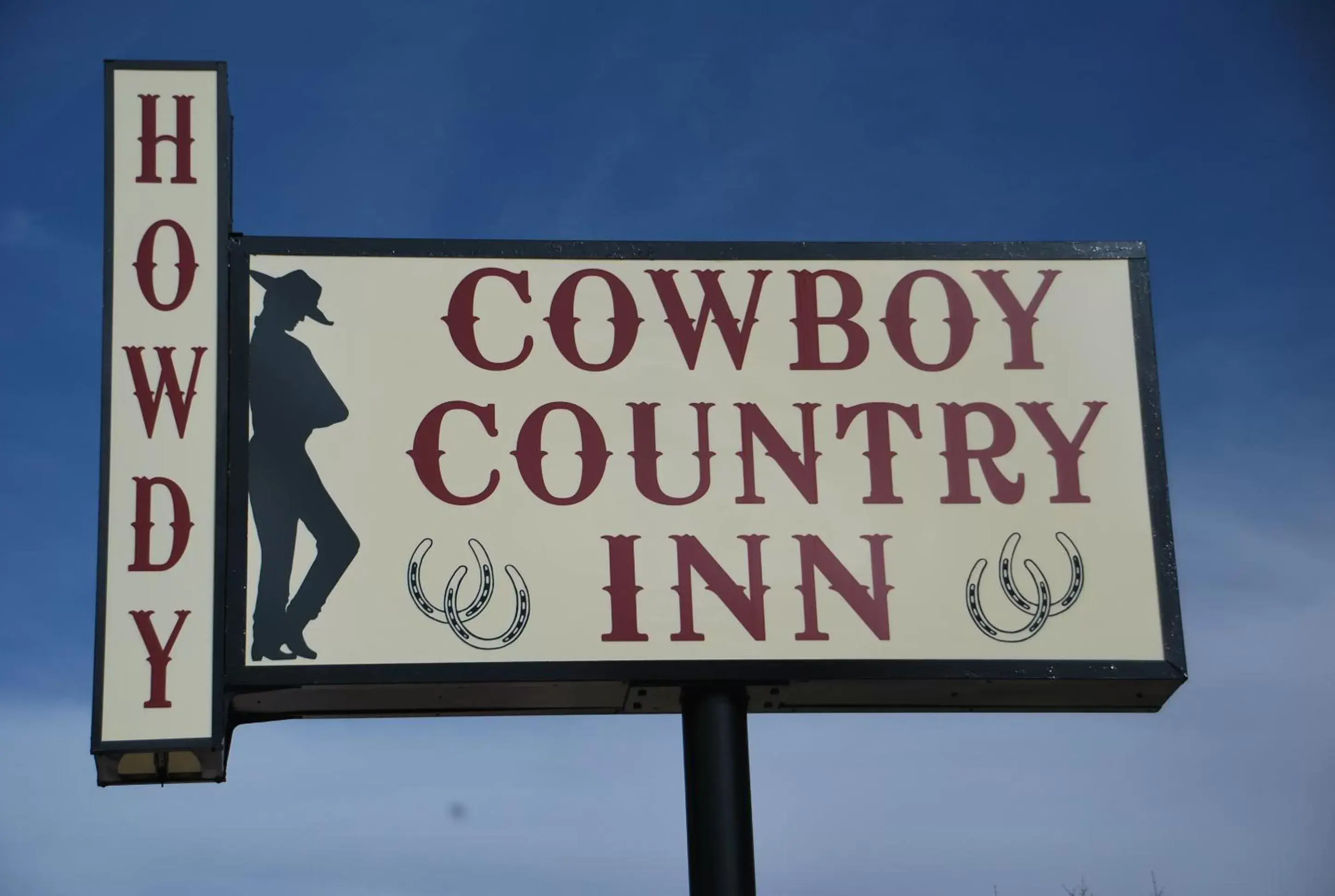 Property logo or sign in Cowboy Country Inn