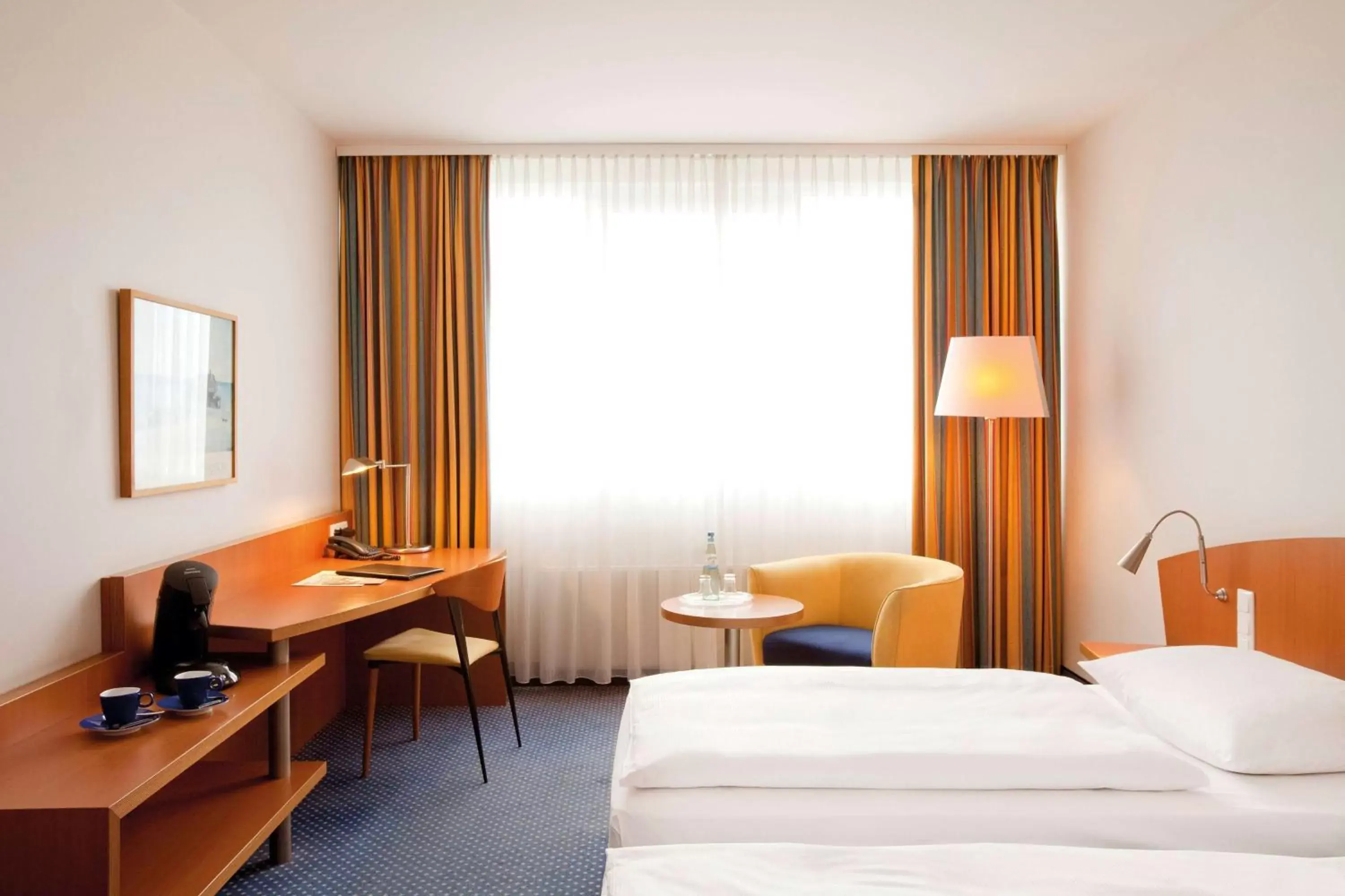 Photo of the whole room, Bed in Vienna House by Wyndham Baltic Stralsund Photo of the whole room, Bed in Vienna House by Wyndham Baltic Stralsund