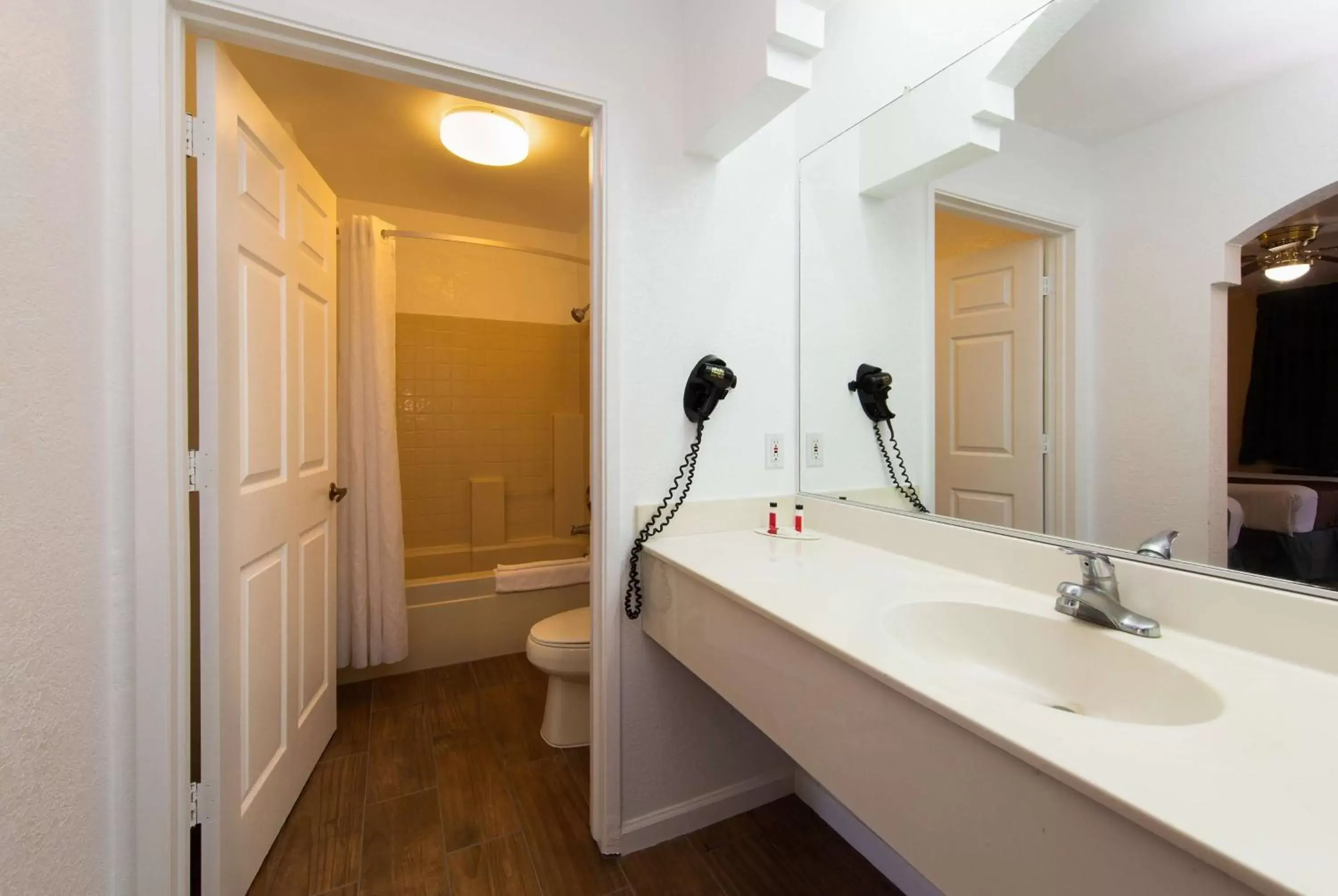 Bathroom in Travel Lodge by Wyndham Merced Yosemite Bathroom in Travel Lodge by Wyndham Merced Yosemite