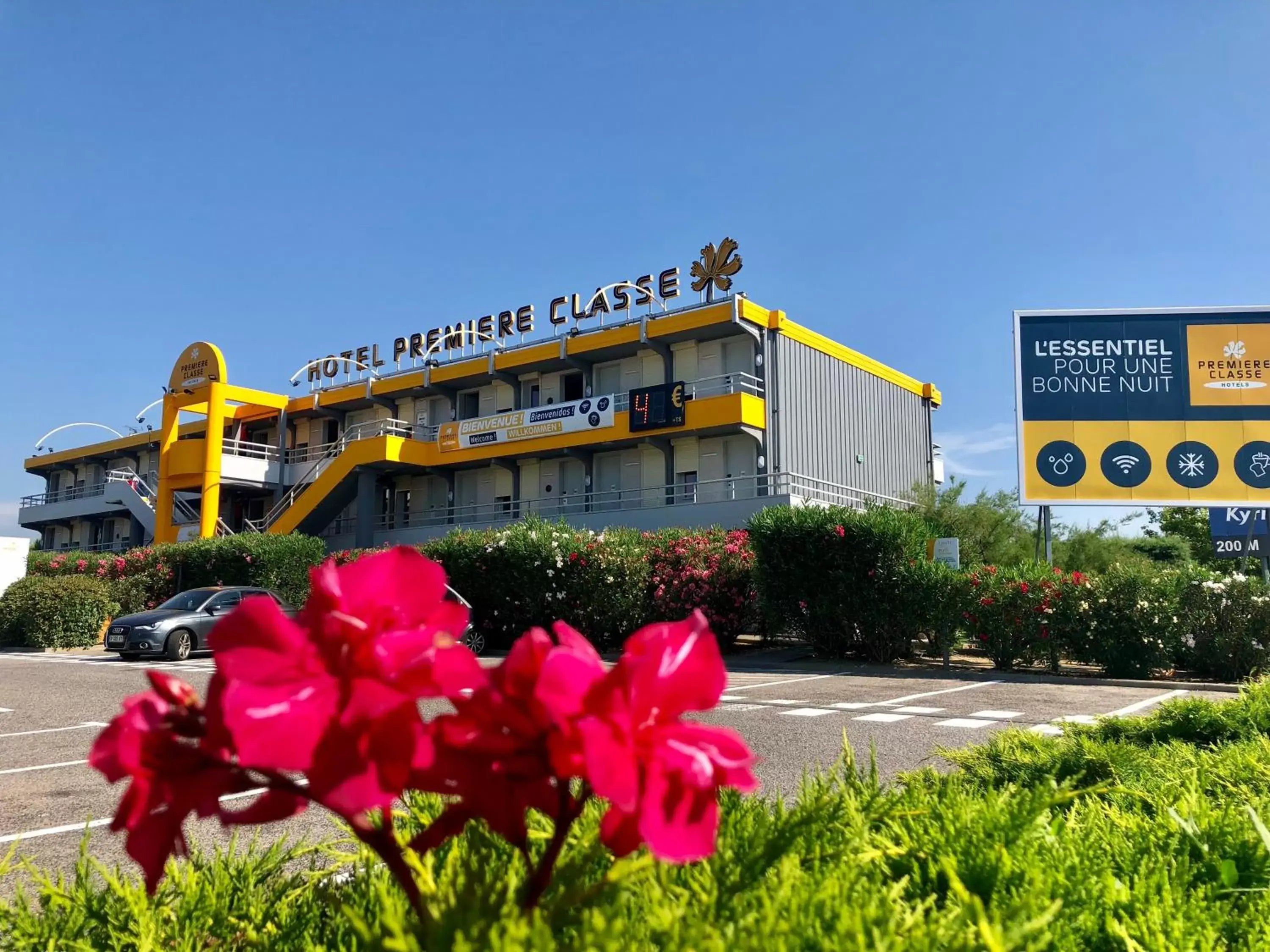 Parking, Property Building in Premiere Classe Perpignan Sud