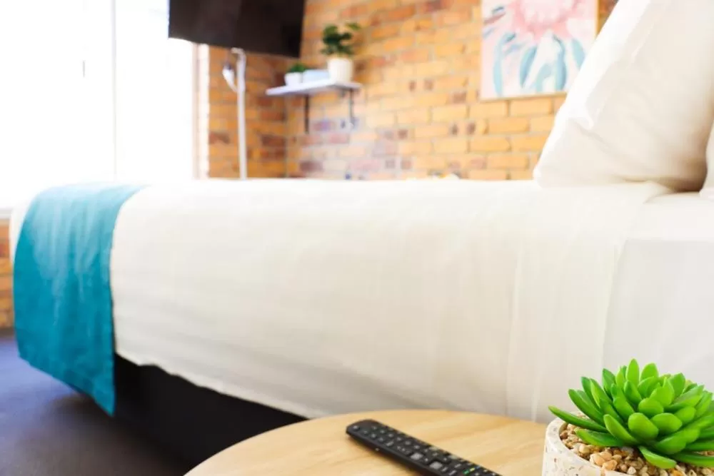 Bed in Kennedy Drive Boutique Motel - Close To City Centre & Airport