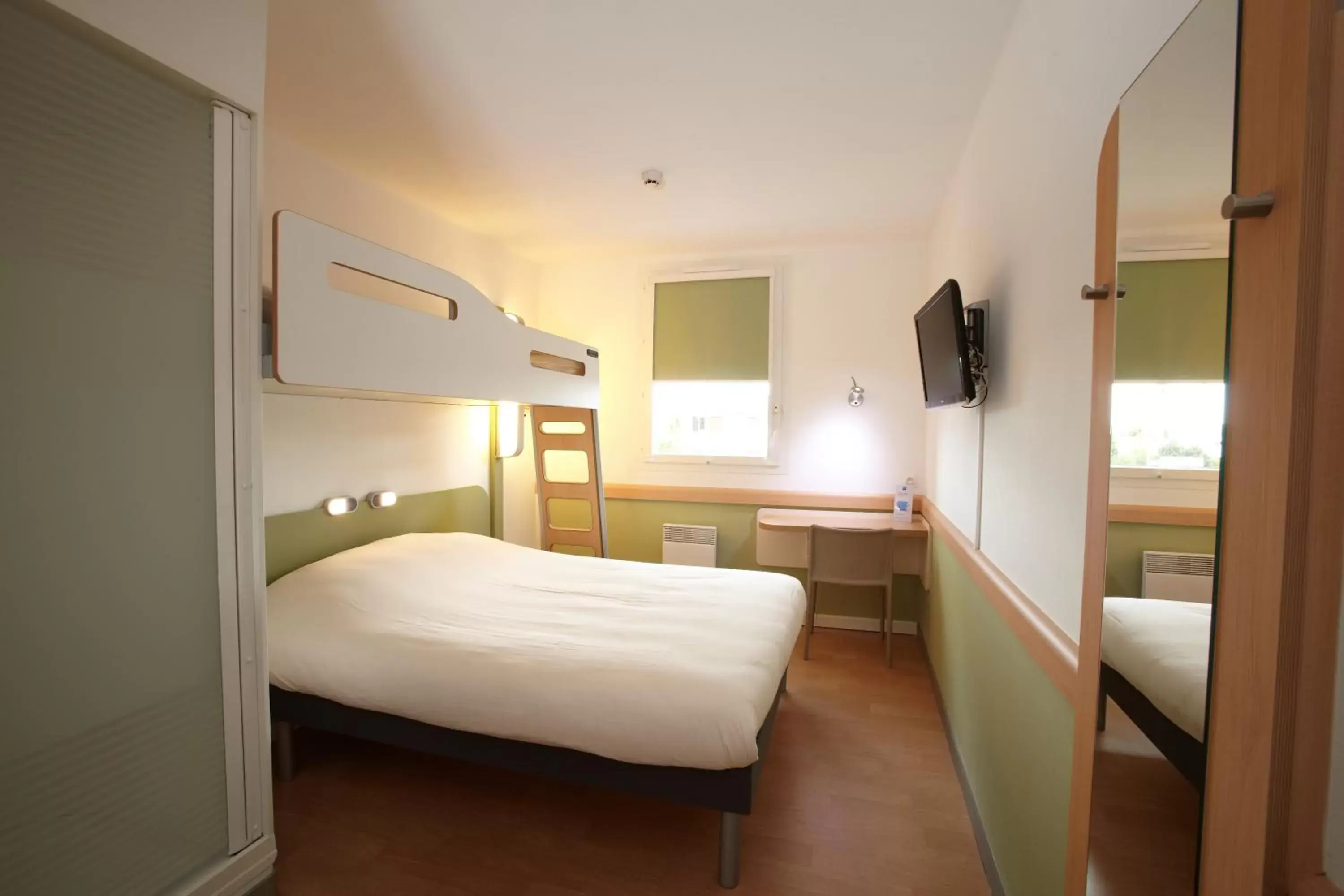 Bedroom in ibis budget Pontarlier