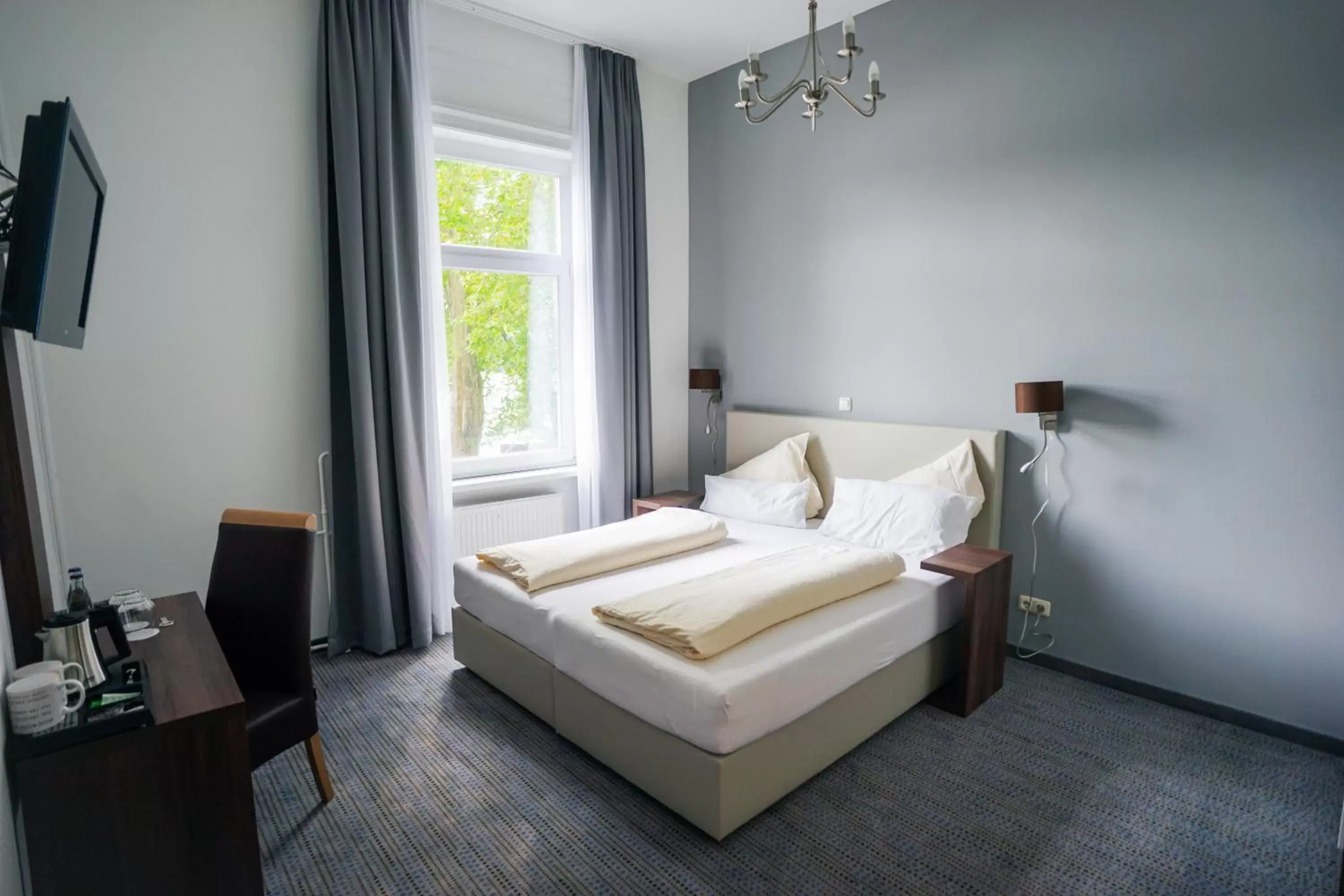 Bed in Hotel Am Schloss Biebrich