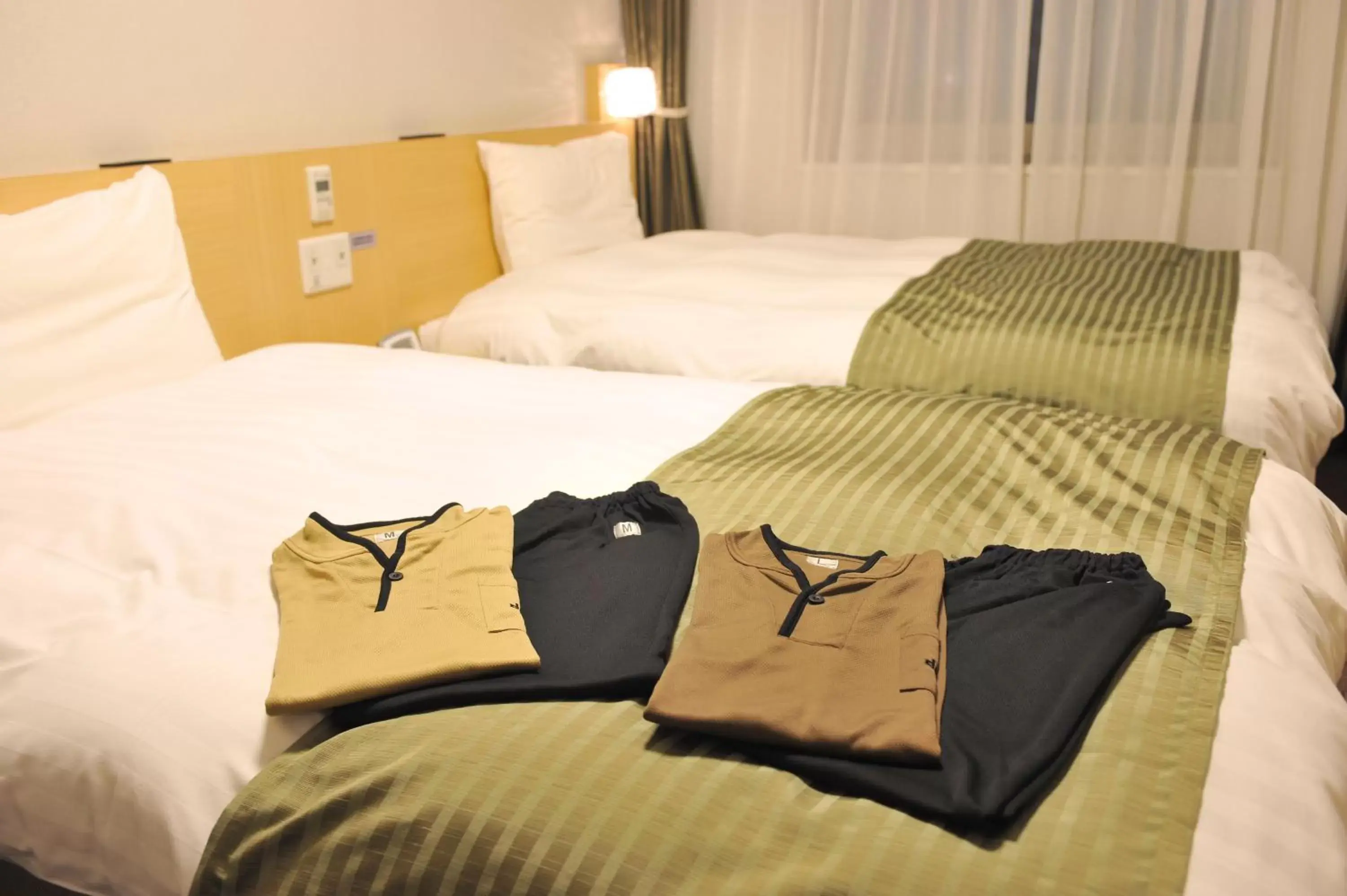 Bed in Dormy Inn Obihiro