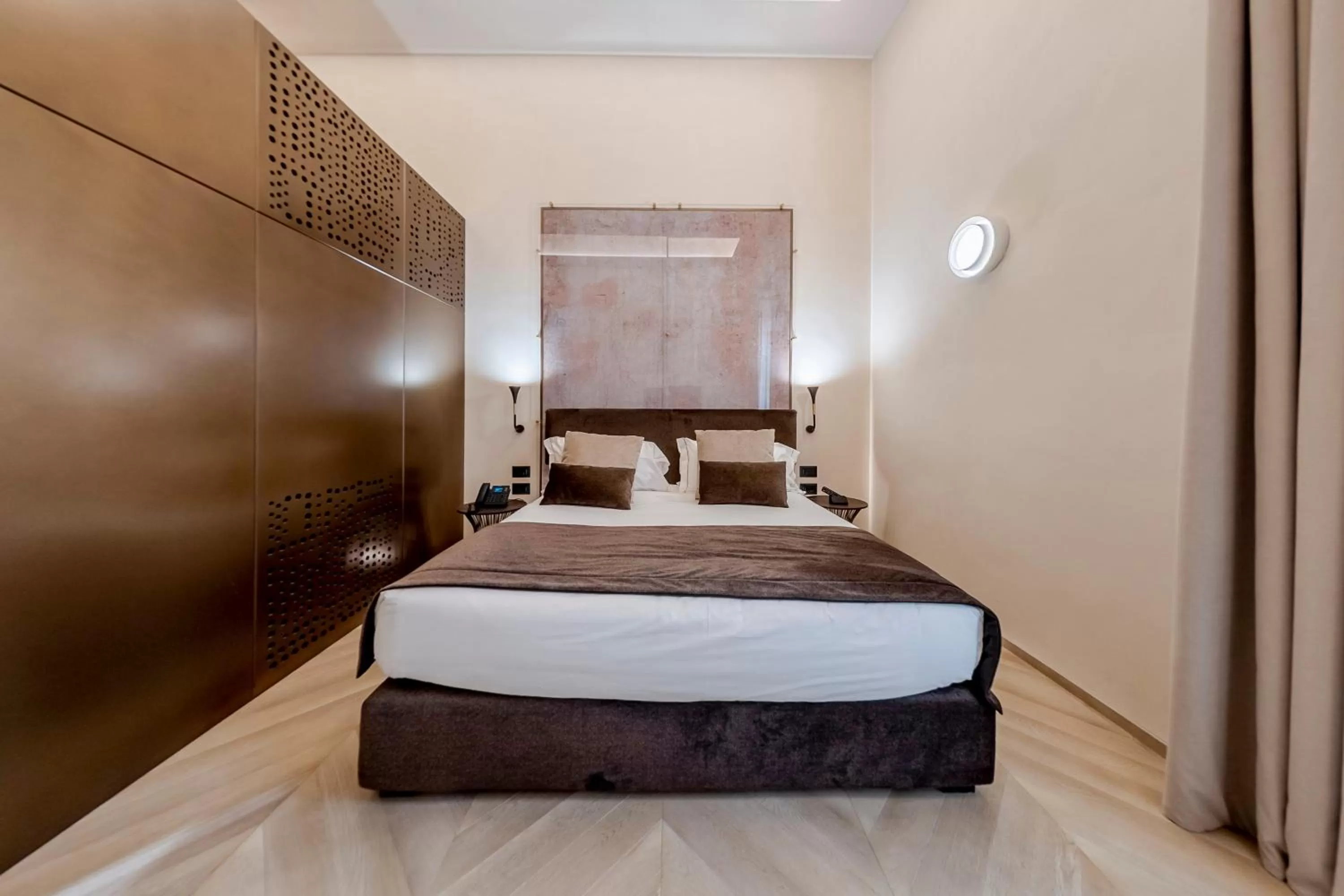 Bed in Martius Private Suites Hotel