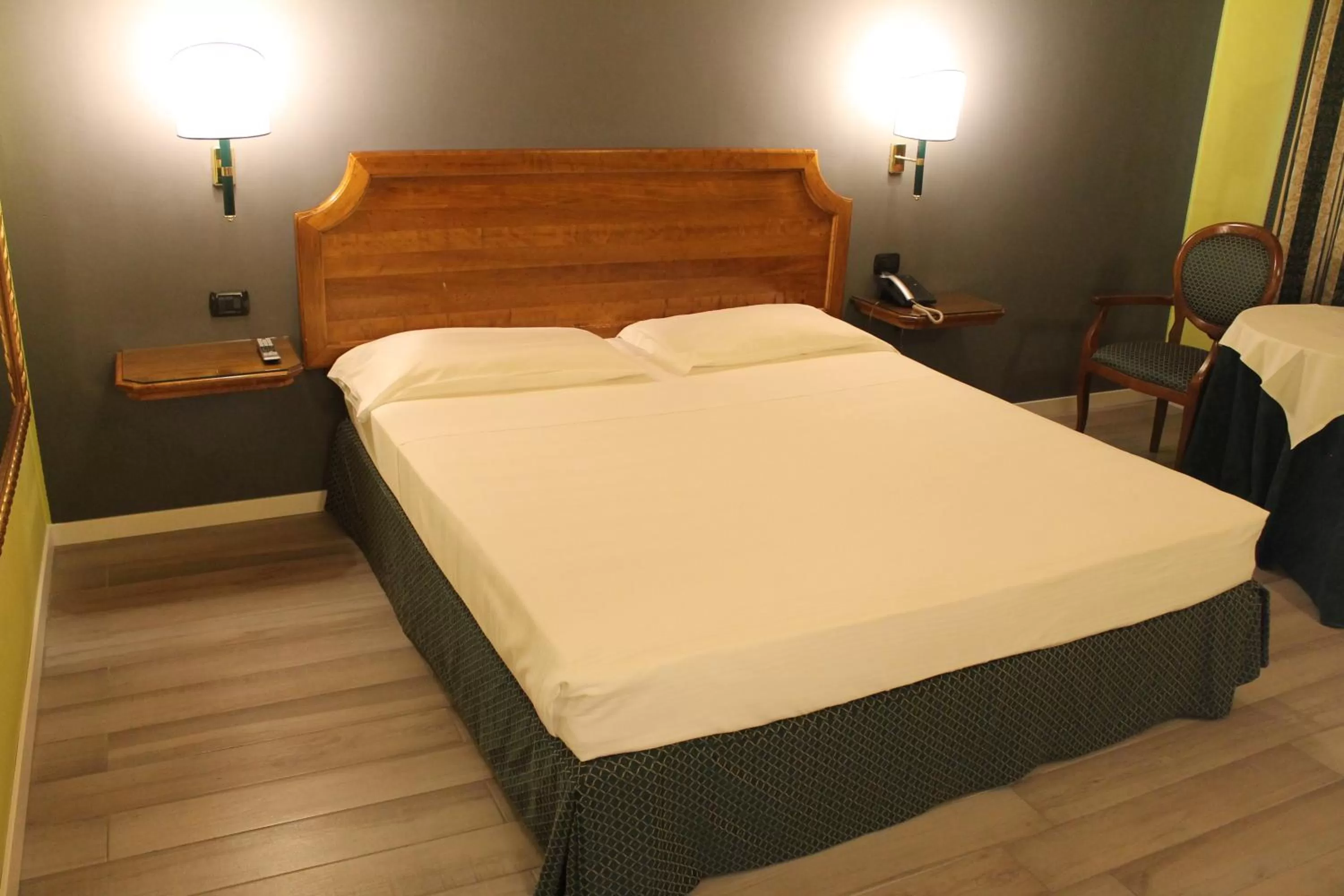 Bed in Hotel Don Carlo