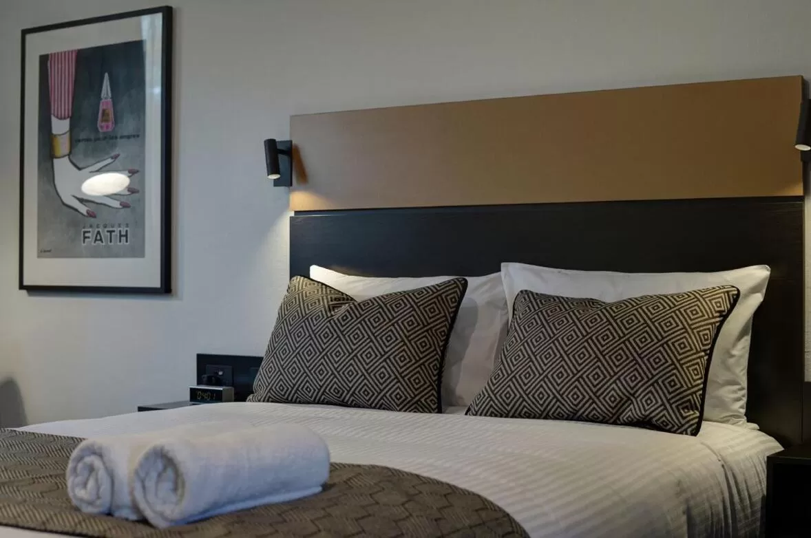 Decorative detail, Bed in CBD Motor Inn