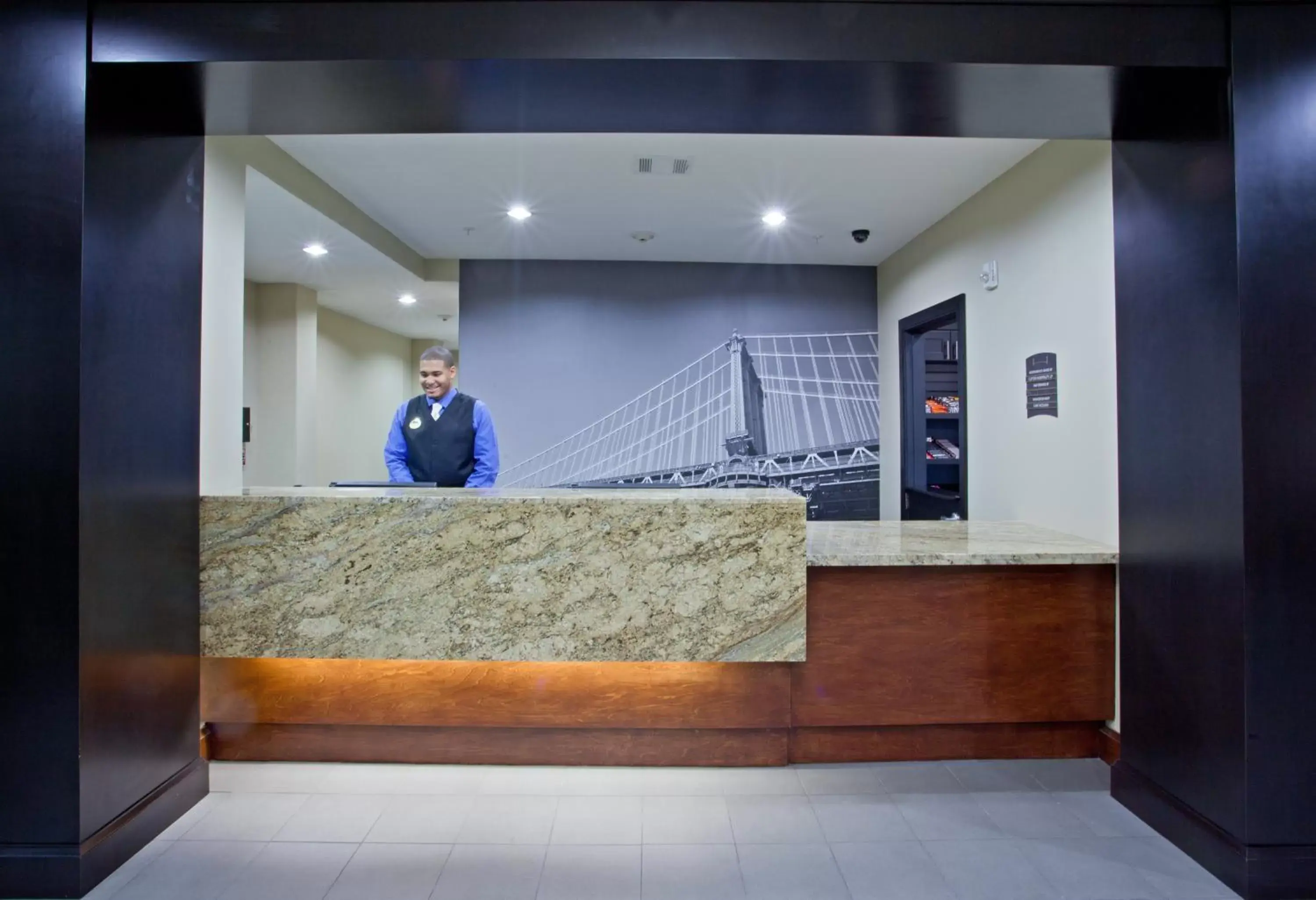 Lobby or reception, Staff in Staybridge Suites Houston Stafford - Sugar Land, an IHG Hotel