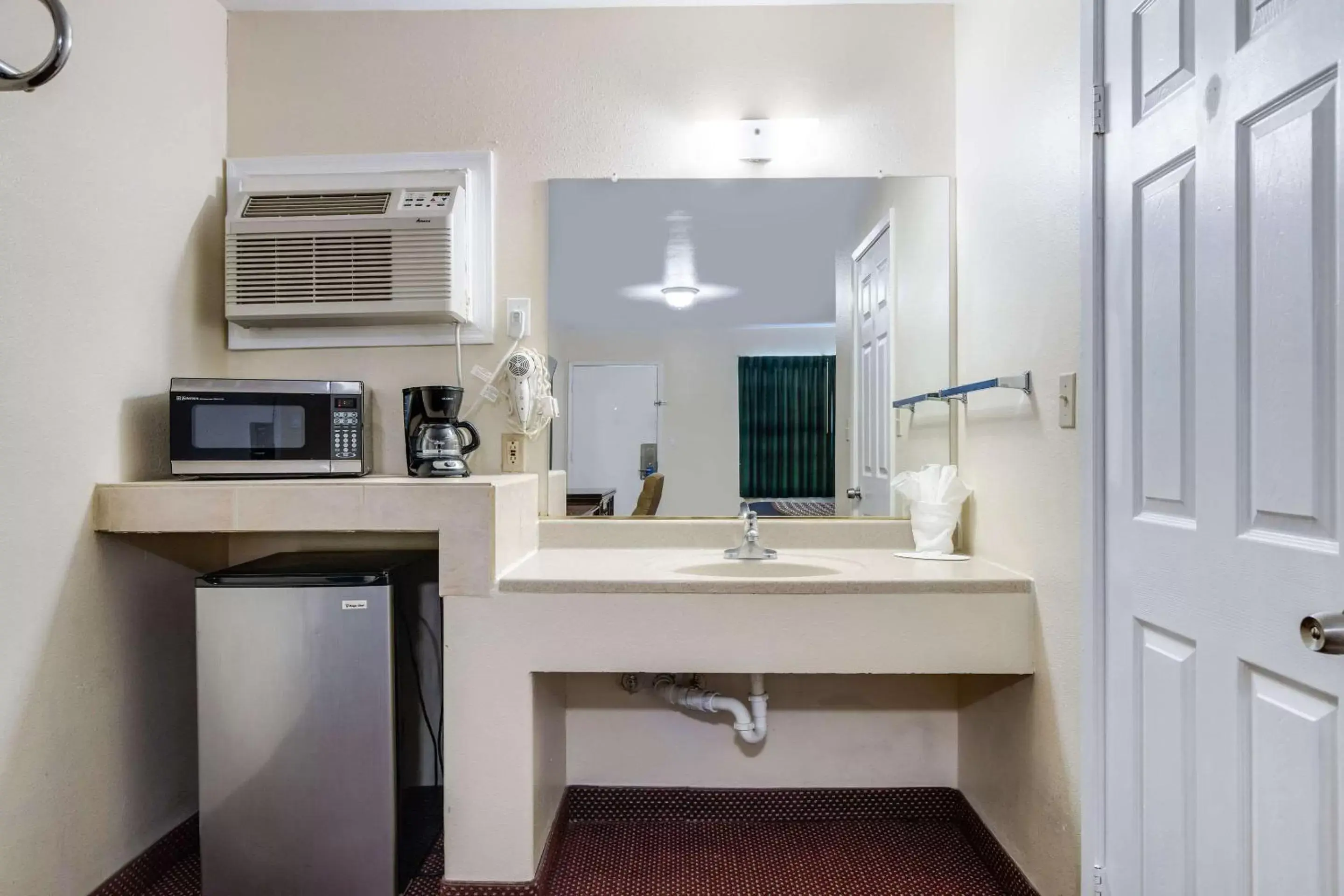 Photo of the whole room, Bathroom in Rodeway Inn & Suites