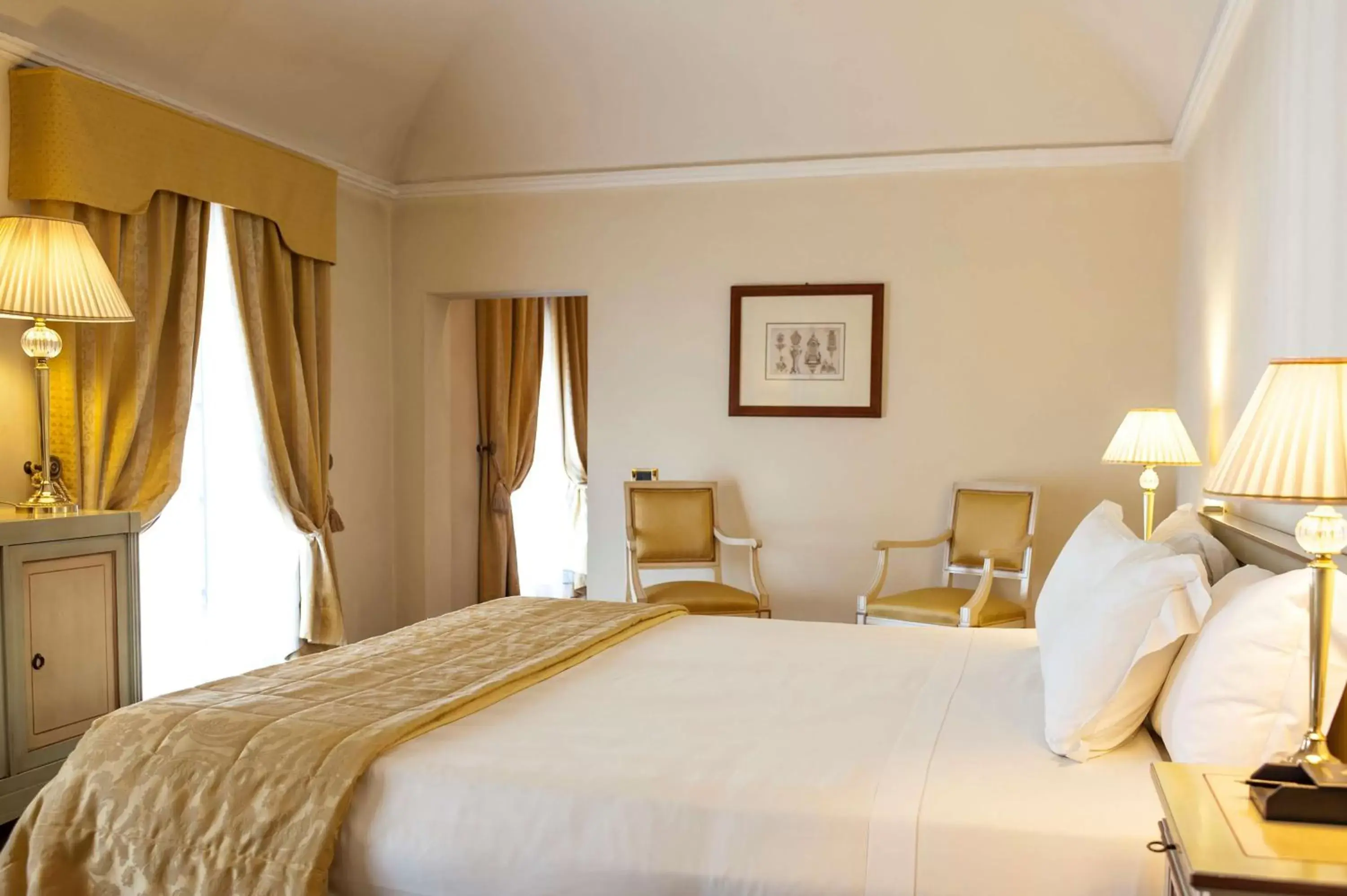 Living room, Bed in Grand Hotel Villa Torretta, Curio Collection by Hilton