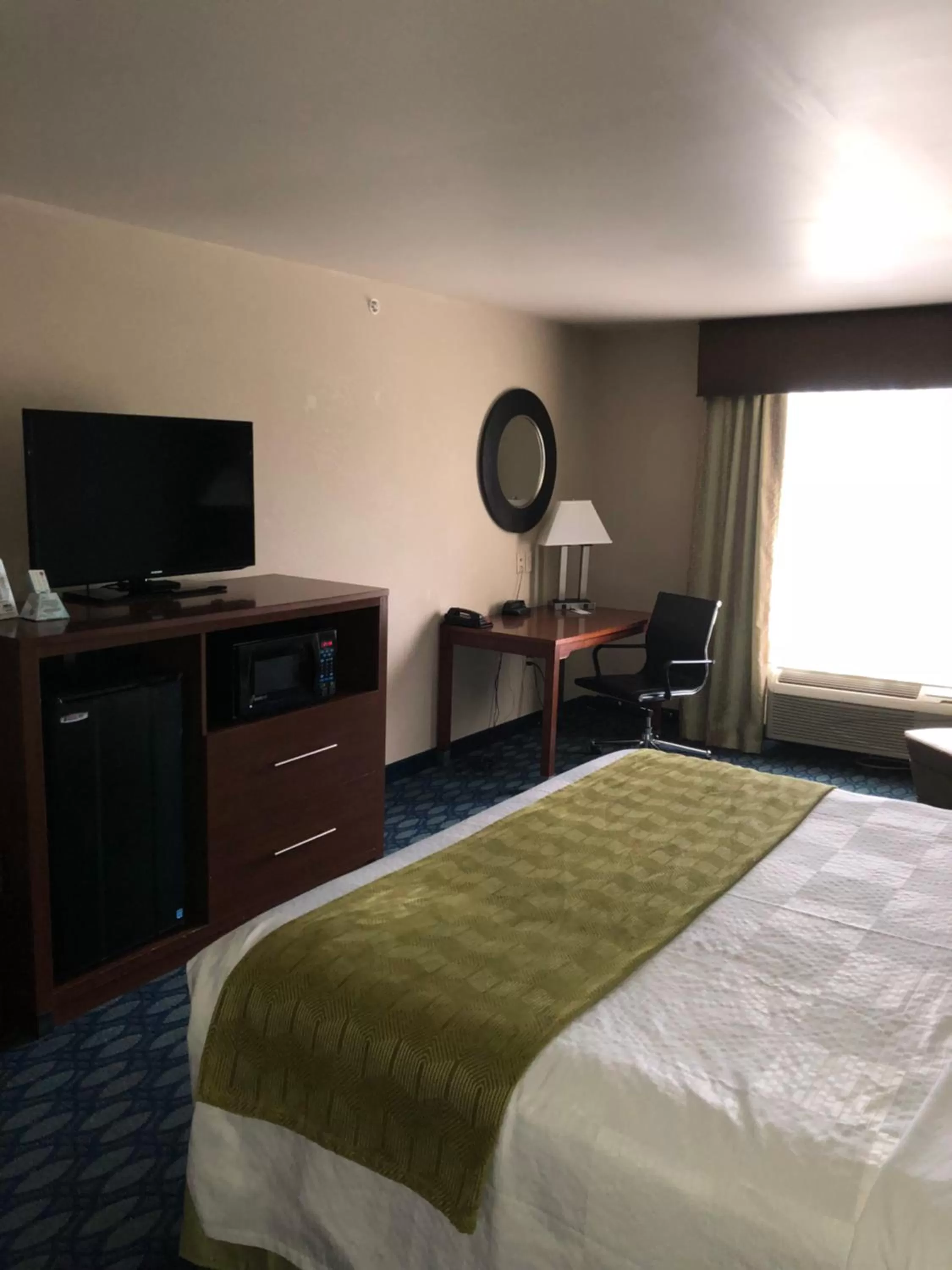 Bed in Countryview Inn & Suites