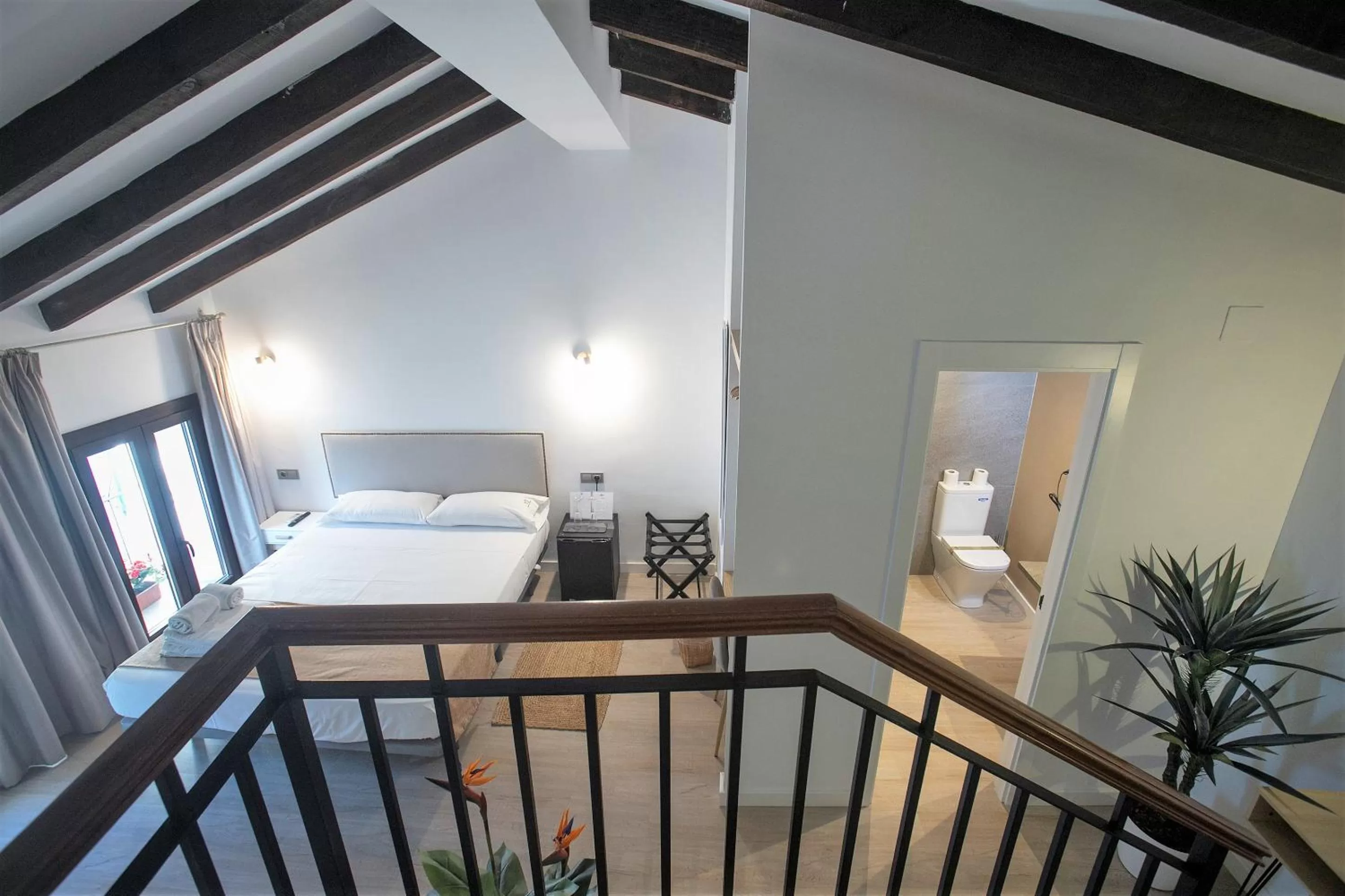 Photo of the whole room, Bed in Vitium Córdoba