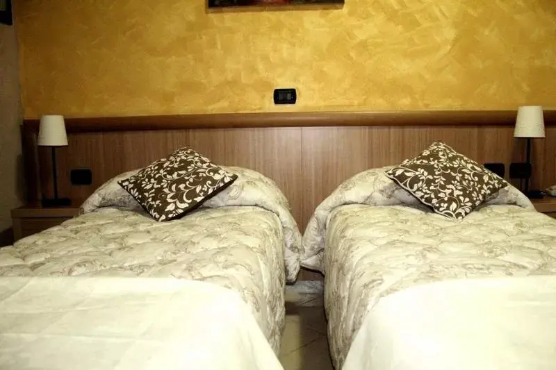 Bed in Albergo Posta