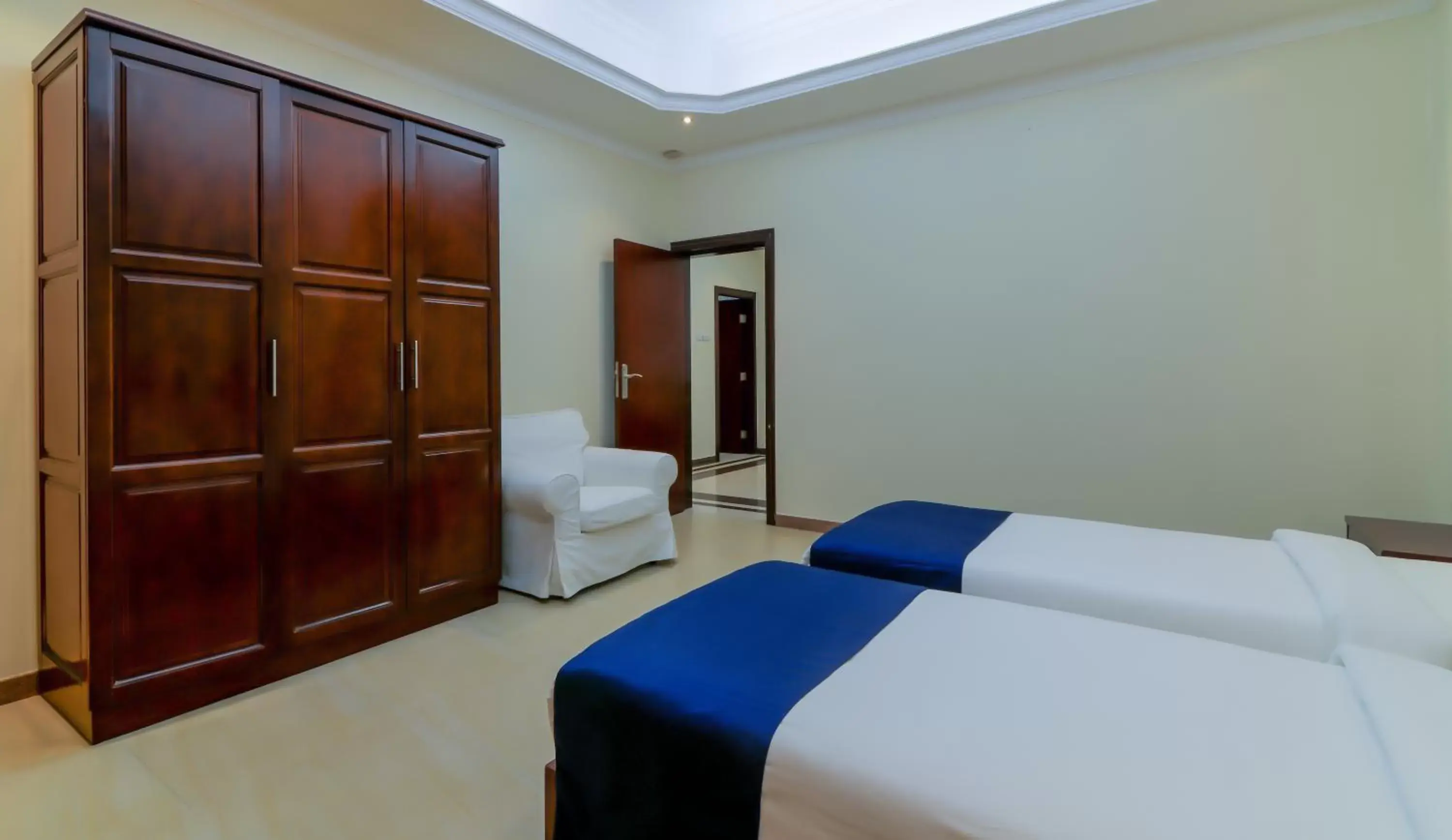 Bedroom, Bed in Tanzanite Executive Suites