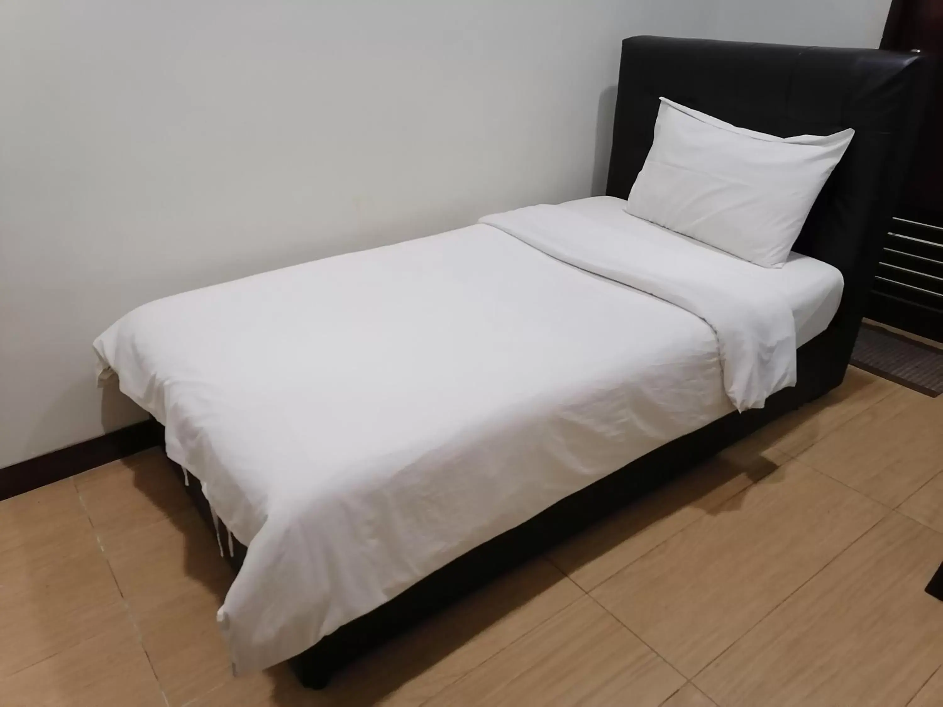 Bed in Fargo Boutique Hotel