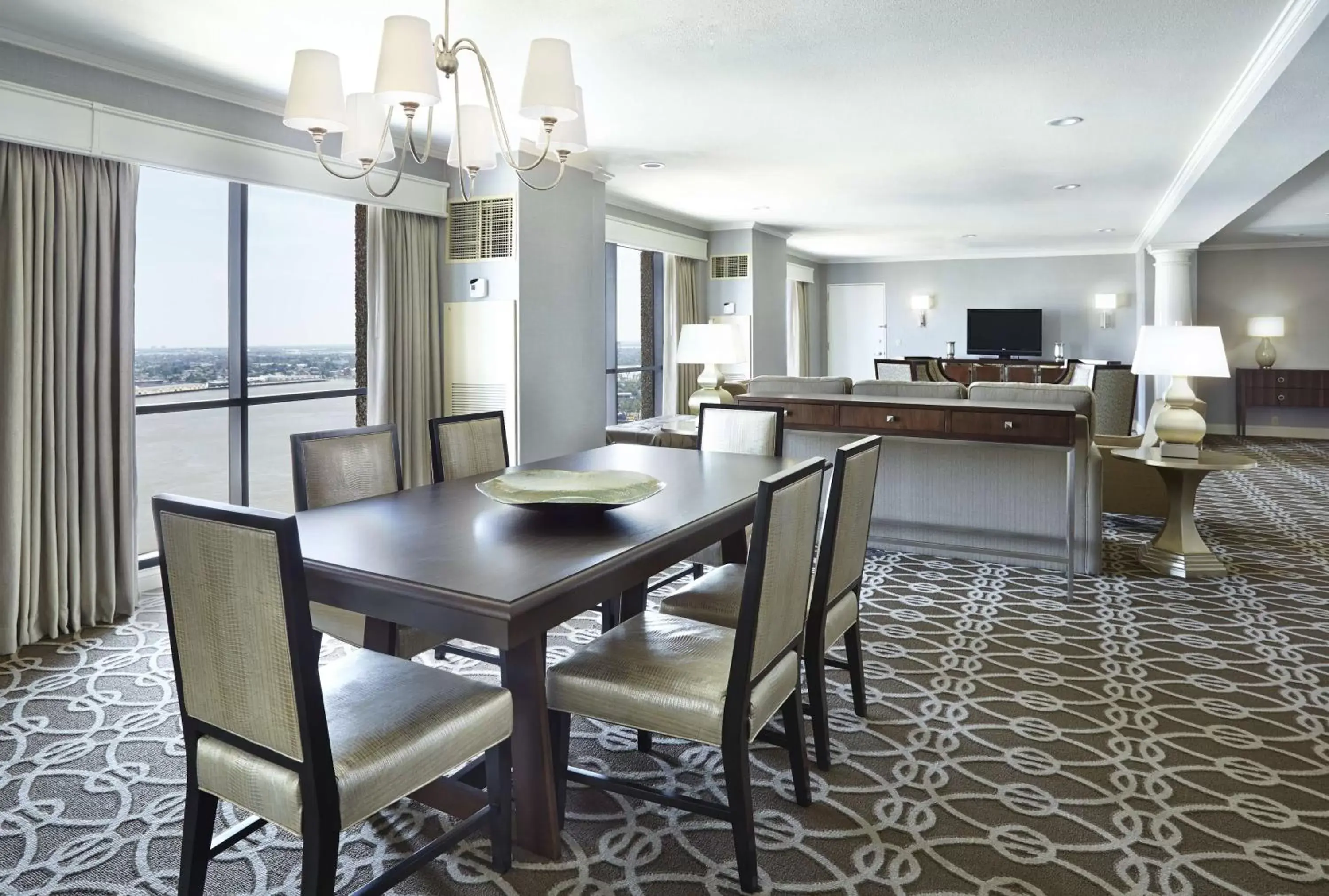 Living room, Dining Area in Hilton New Orleans Riverside