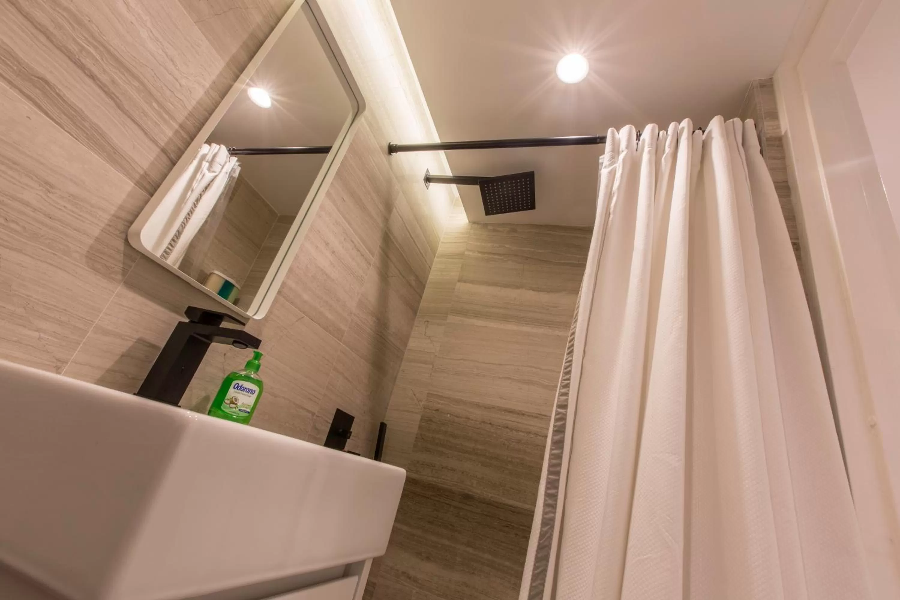 Shower in OCEAN VIEW DELUXE SUITE: PVT. BEACH & POOL