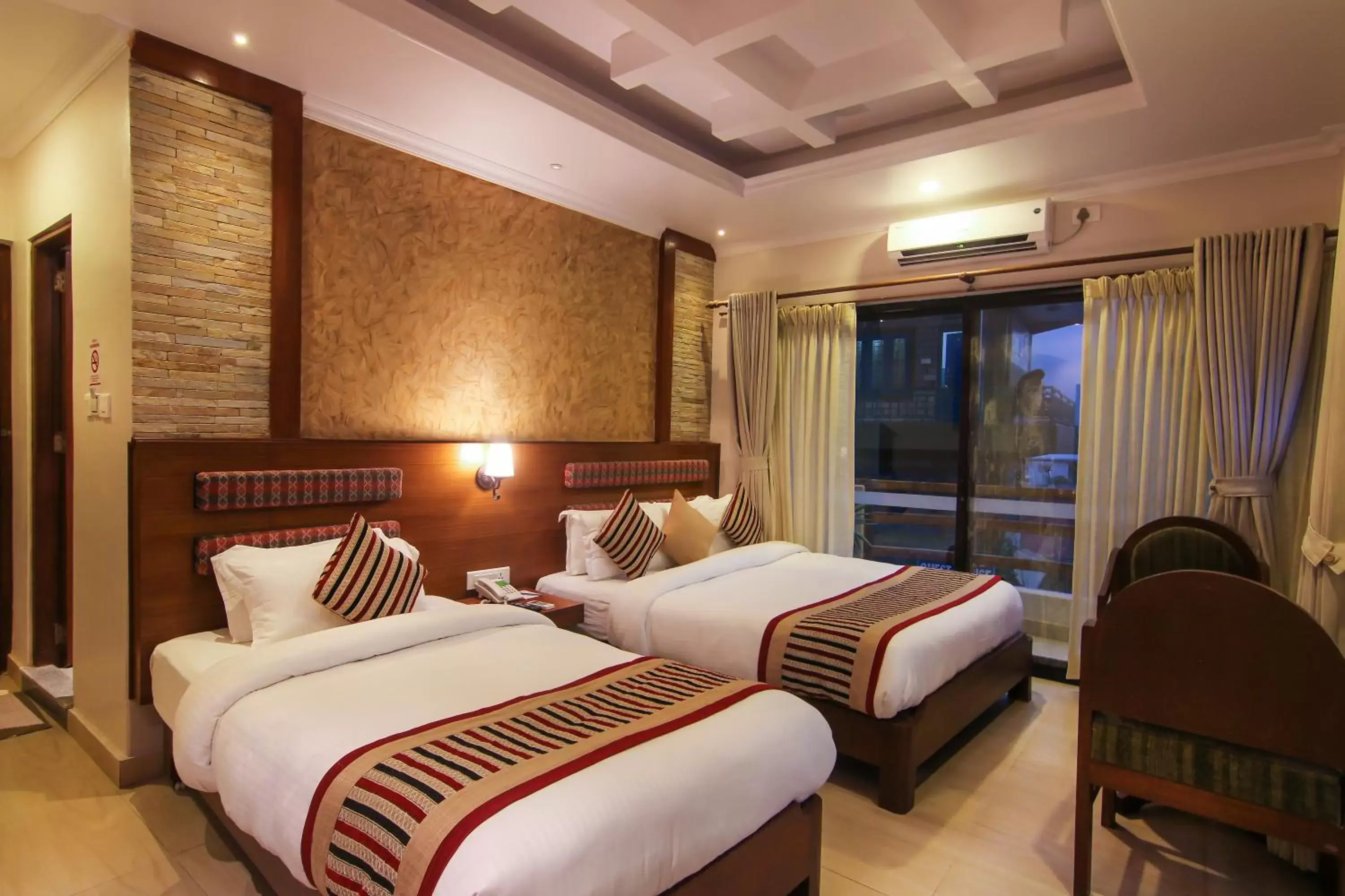 Bed in Kuti Resort & Spa