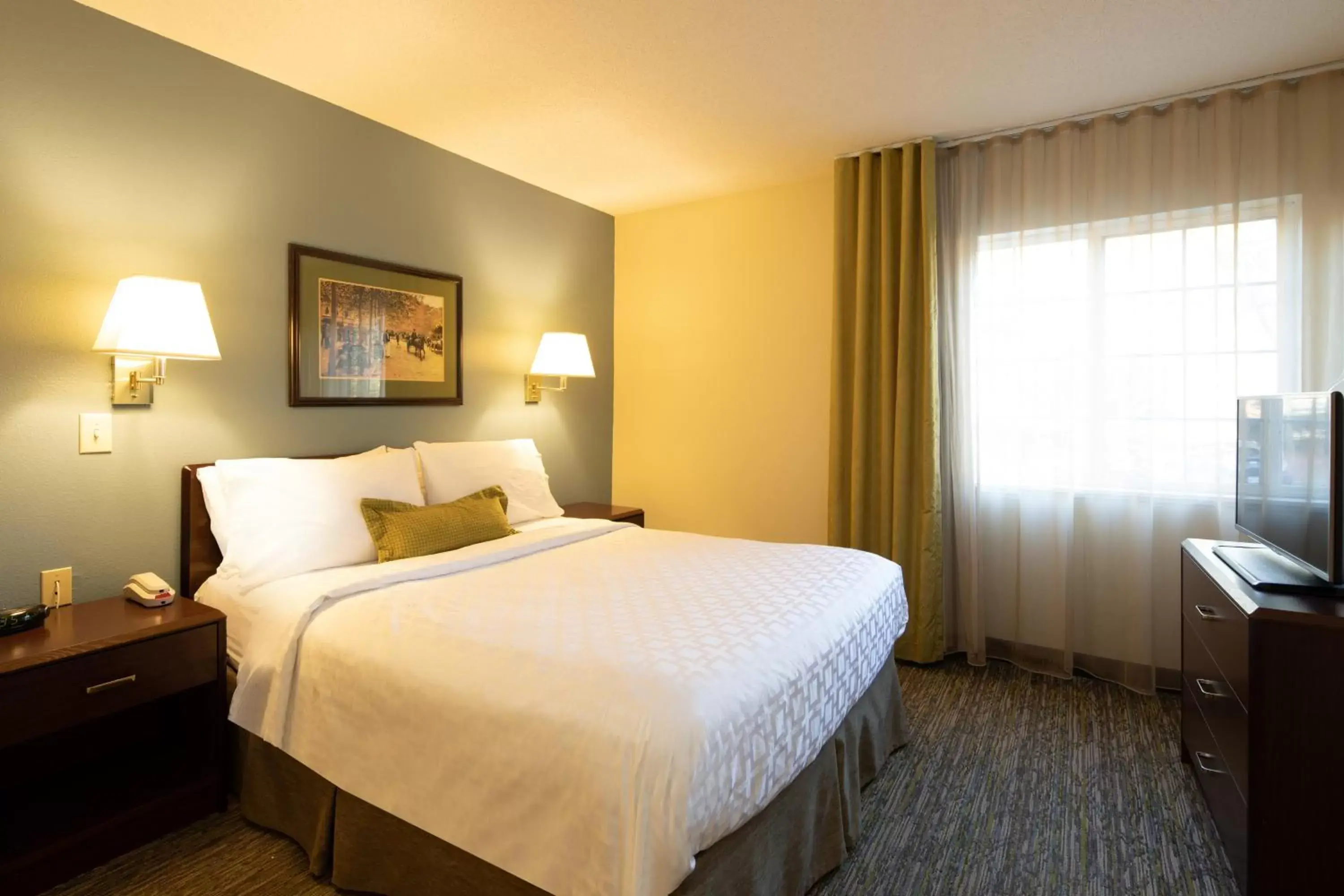 Bedroom, Bed in Candlewood Suites Raleigh Crabtree by IHG Bedroom, Bed in Candlewood Suites Raleigh Crabtree by IHG