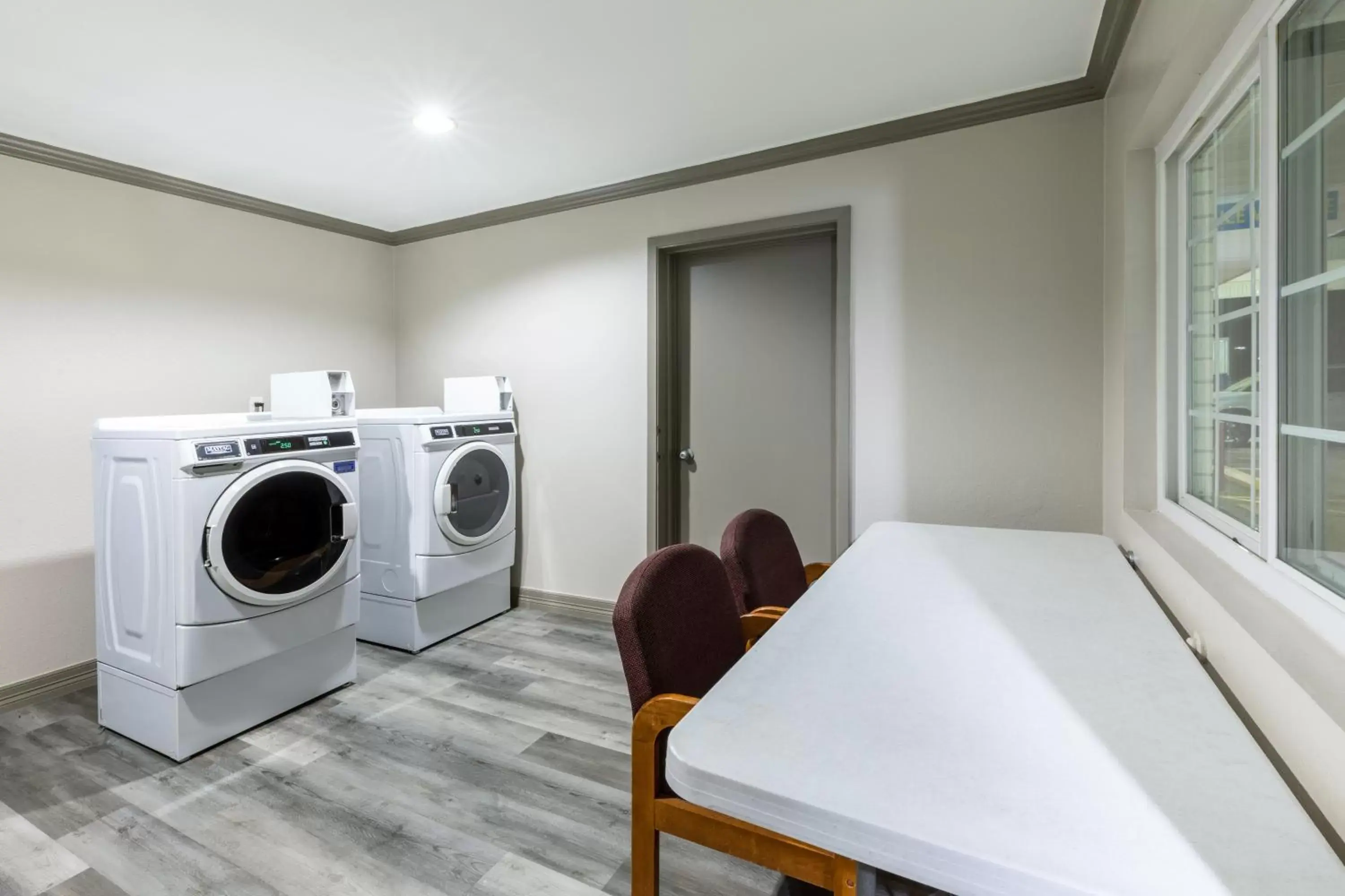 laundry, Dining Area in Days Inn by Wyndham Baytown TX