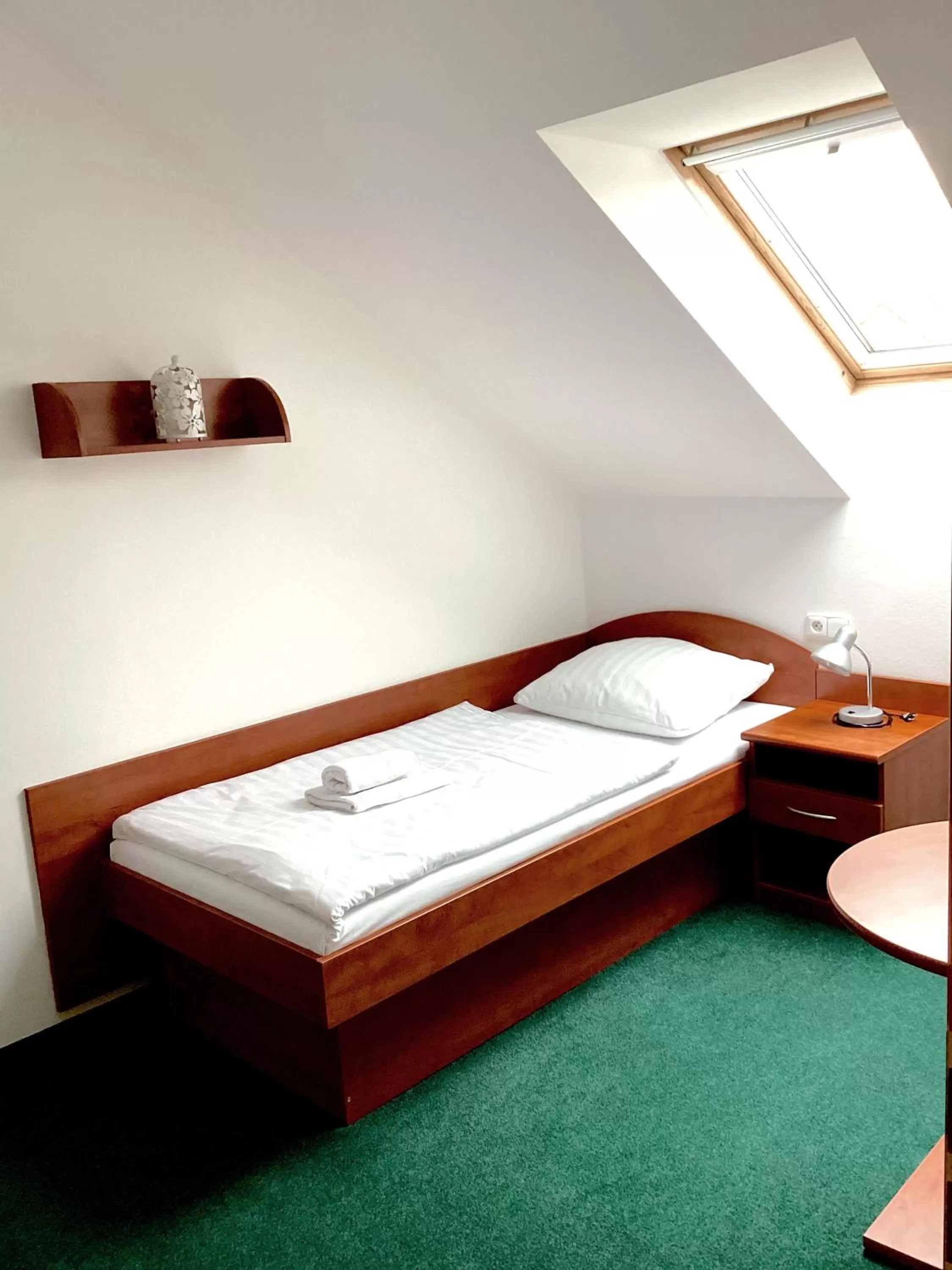 Bed in Hotel Karolina