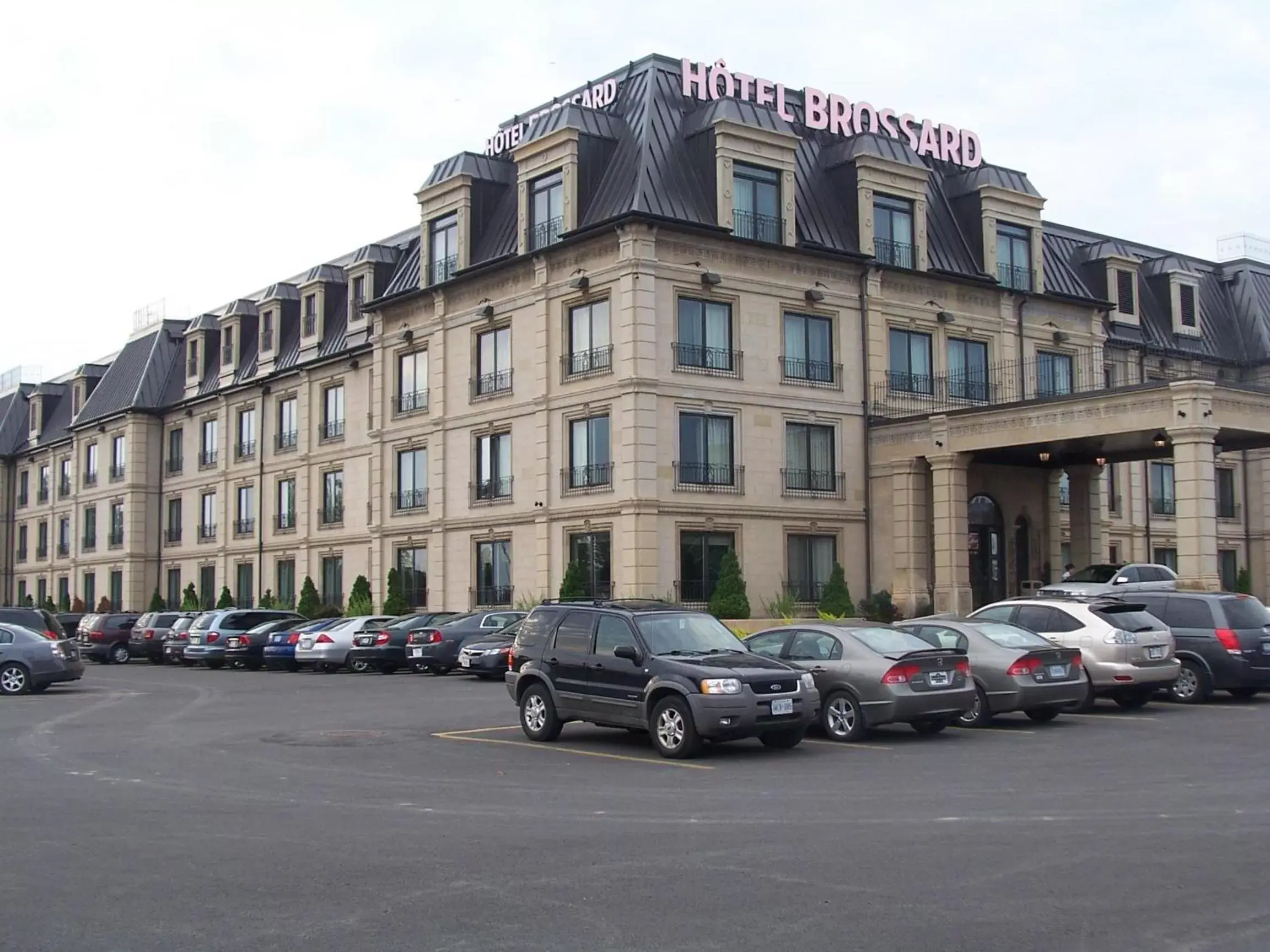 Property logo or sign, Property Building in Hotel Brossard