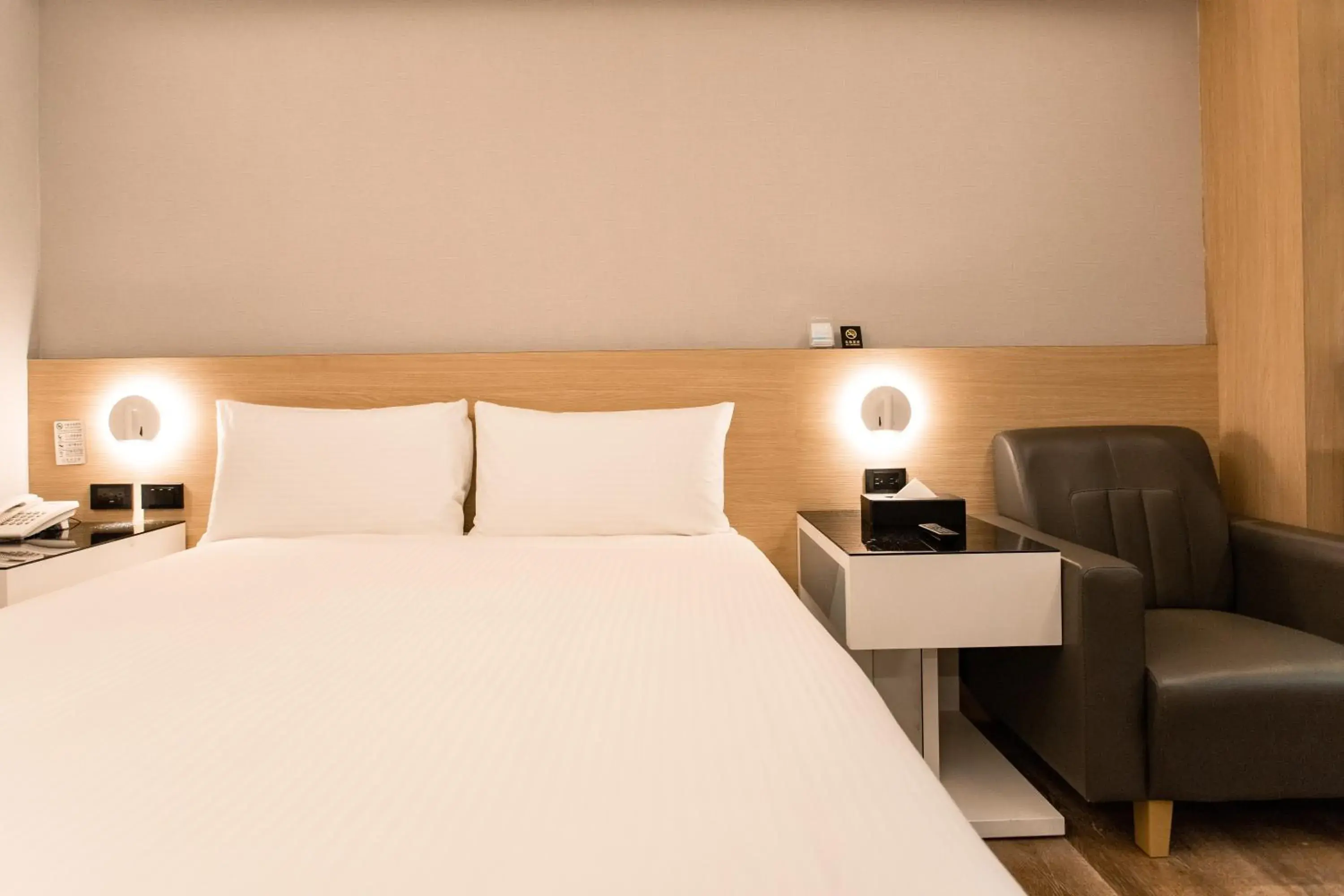 Bed in Hub Hotel Tucheng