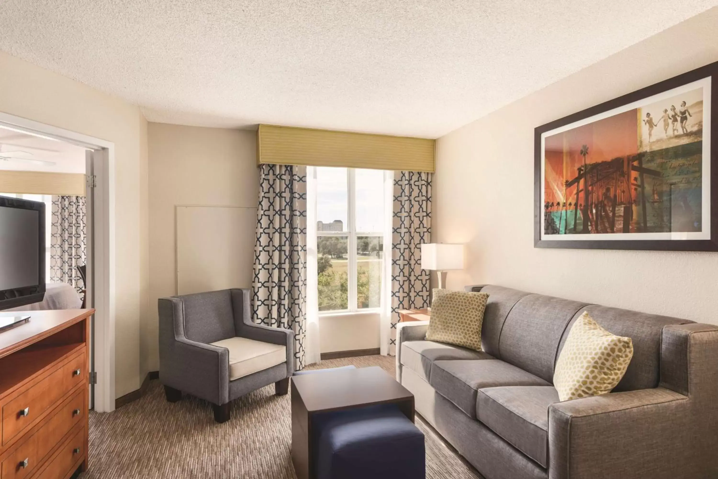 Living room, Seating Area in Homewood Suites by Hilton Orlando-Intl Drive/Convention Ctr