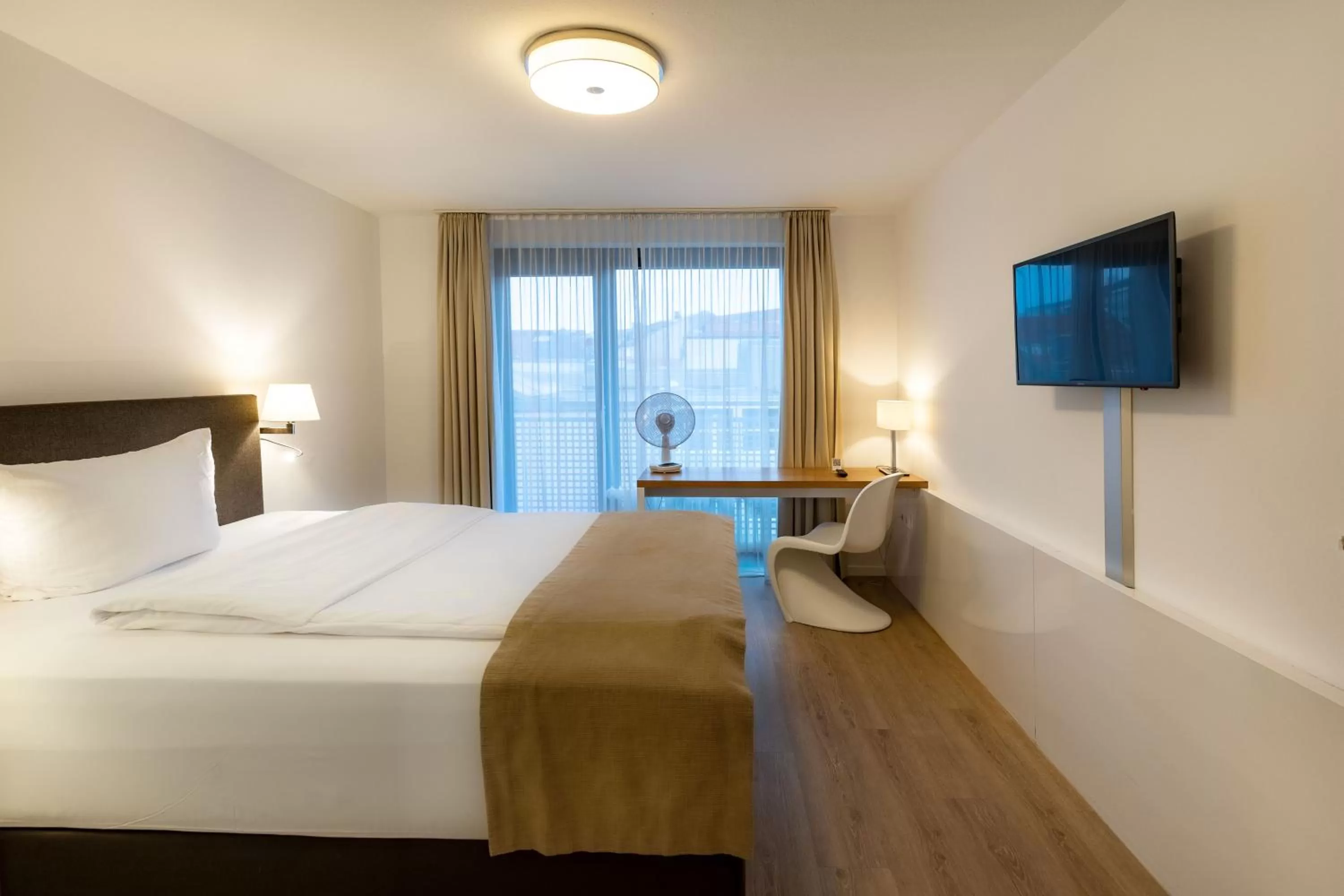 Bed in Downtown Vi Vadi Hotel