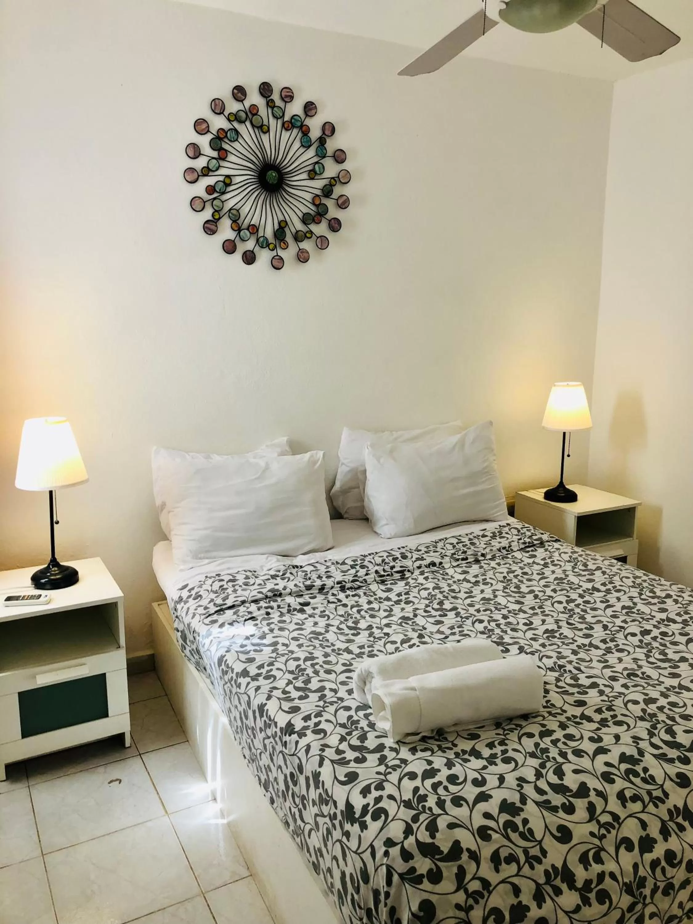 Bed in Los Corales Luxury Villas Beach Club and Spa