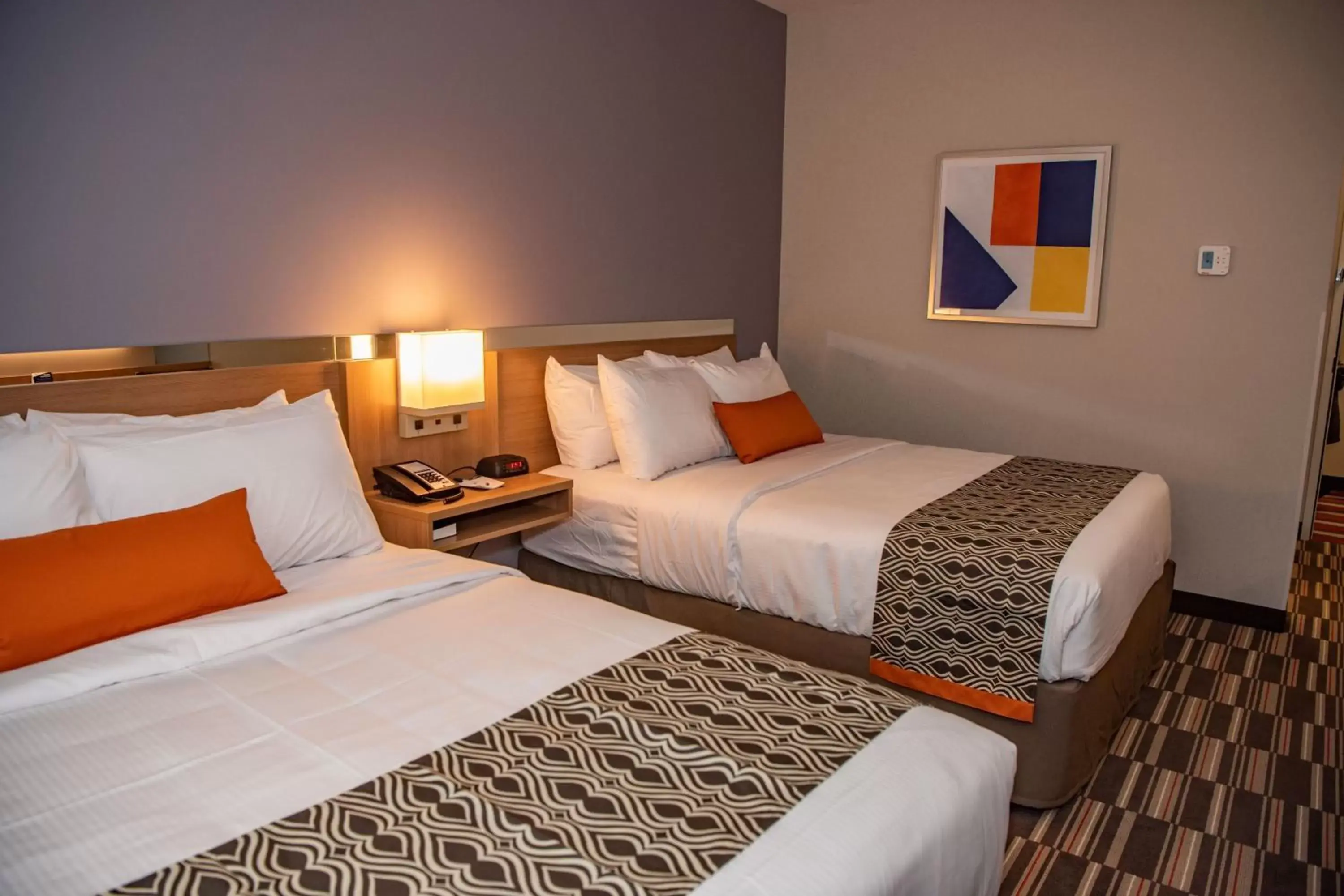 Bed in Microtel Inn & Suites by Wyndham Carlisle