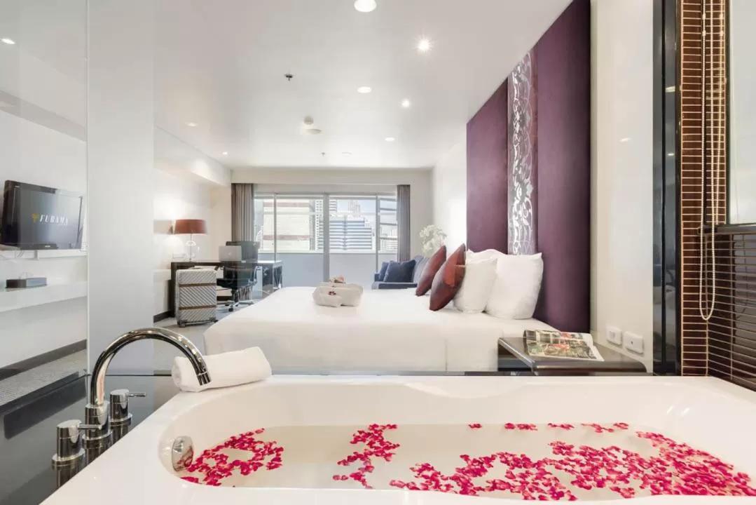 Photo of the whole room, Bed in Furama Silom Hotel