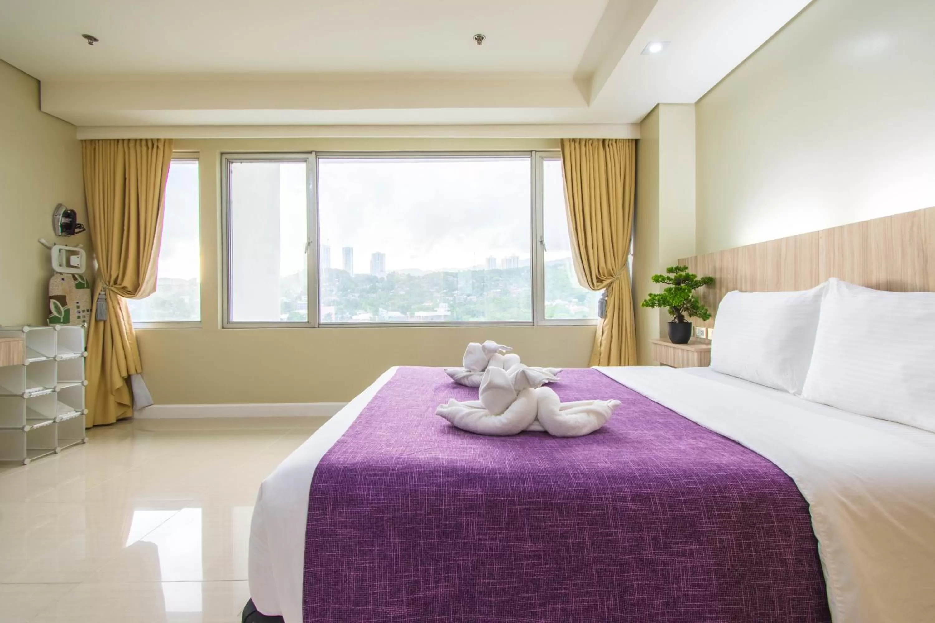 Bed in Alicia Apartelle