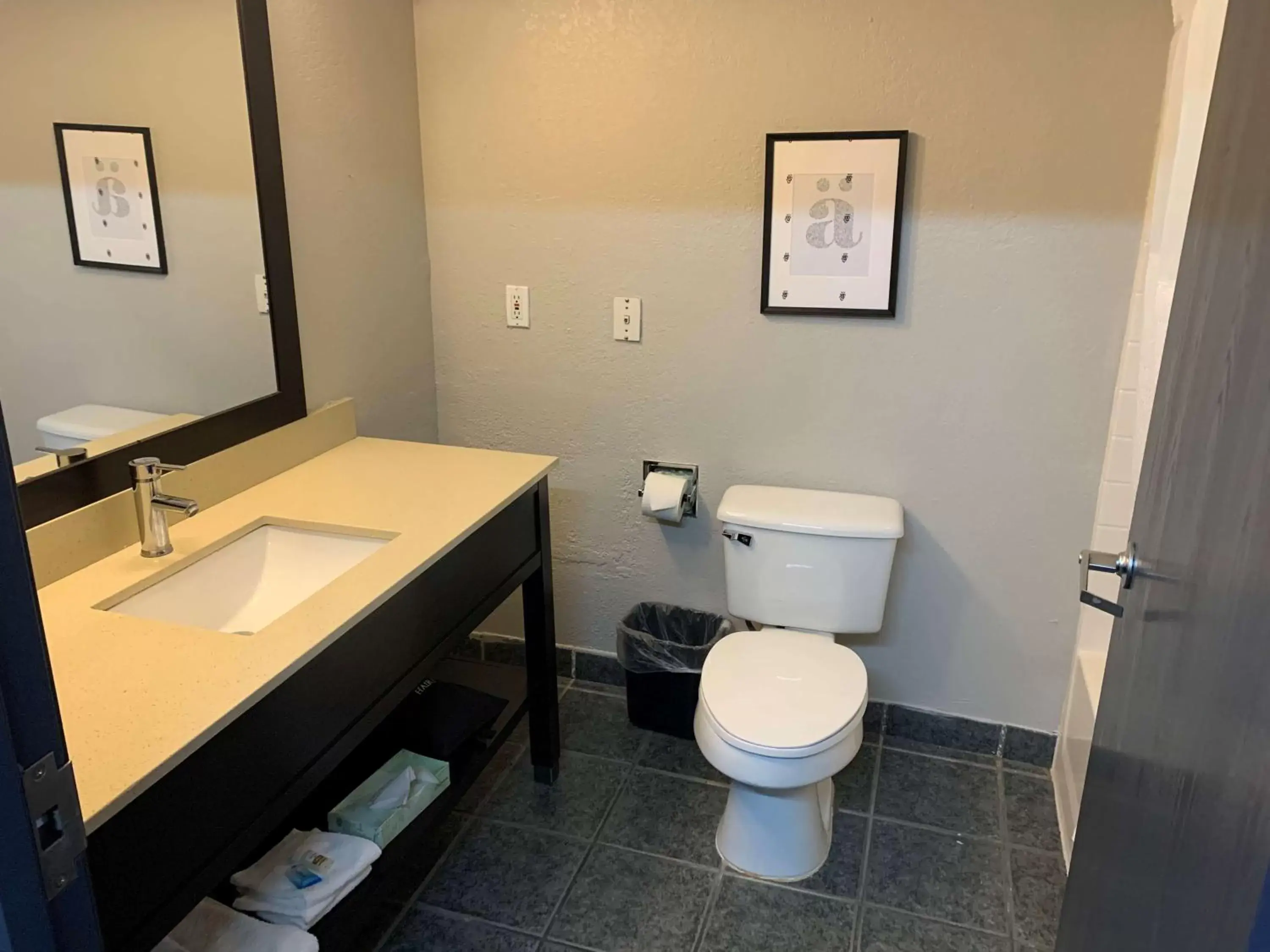 Bathroom in SureStay Plus by Best Western San Antonio Fort Sam Houston