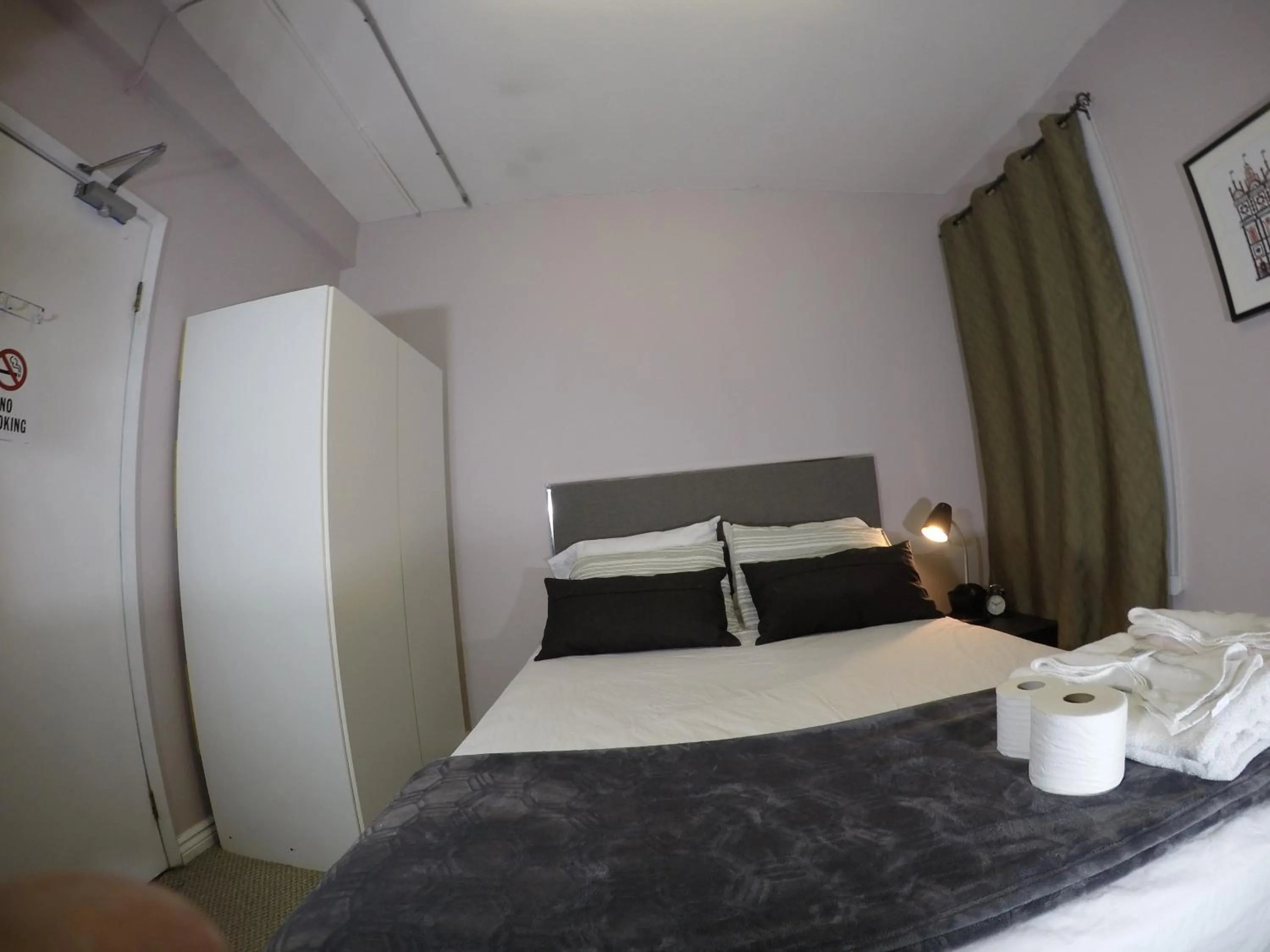 Photo of the whole room, Bed in Saint Lawrence Residences and Suites