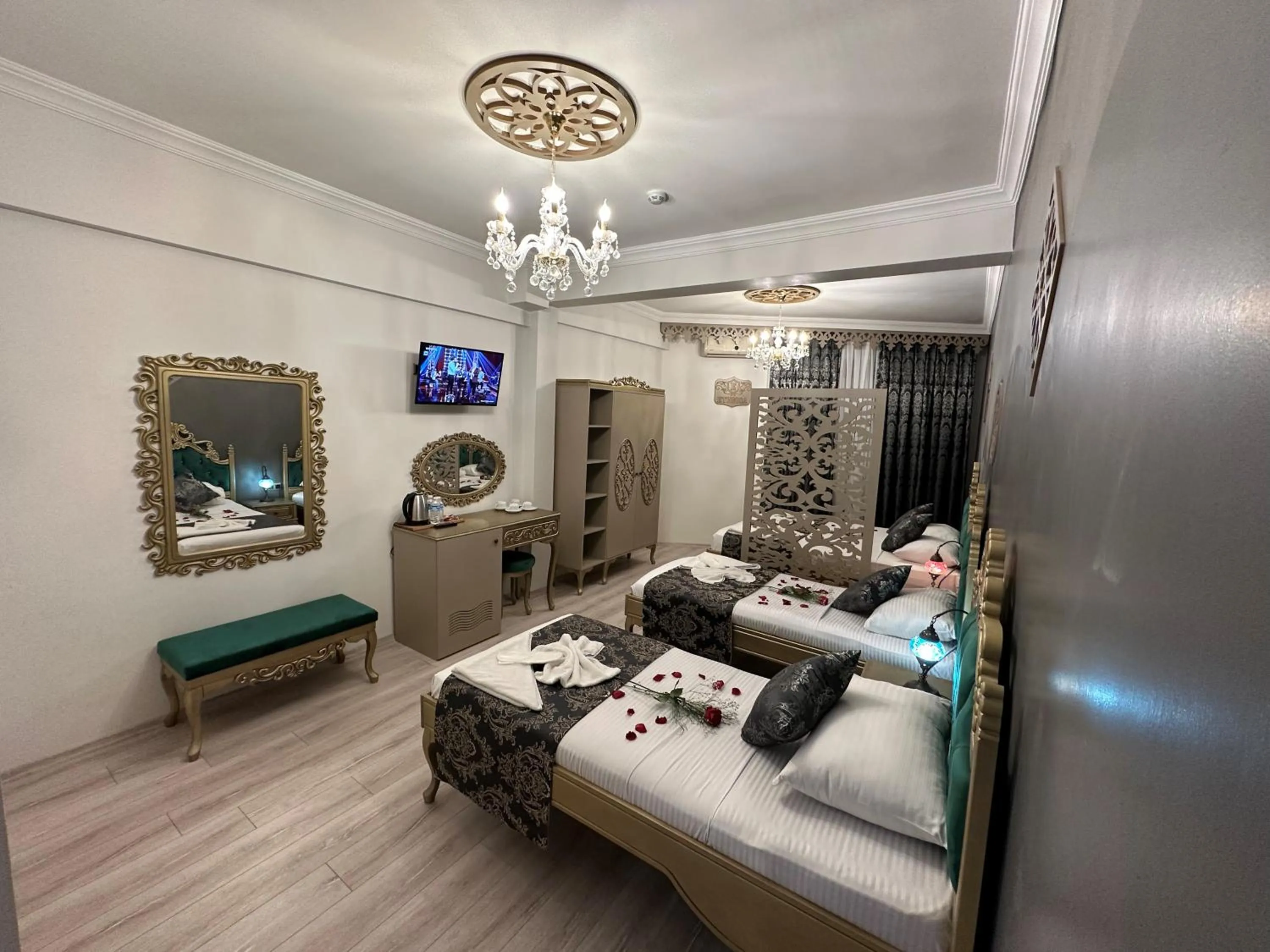 Bed in Ethnica Suites