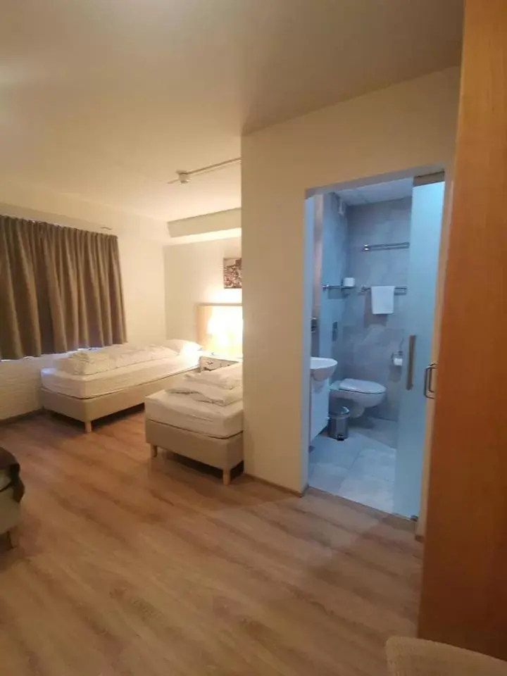 Bed in Hotel Kjarnalundur