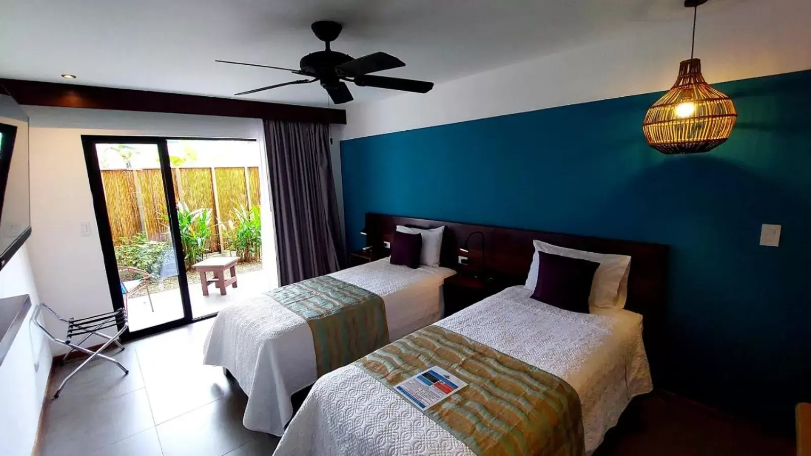 Bed in La Fortuna Lodge by Treebu Hotels