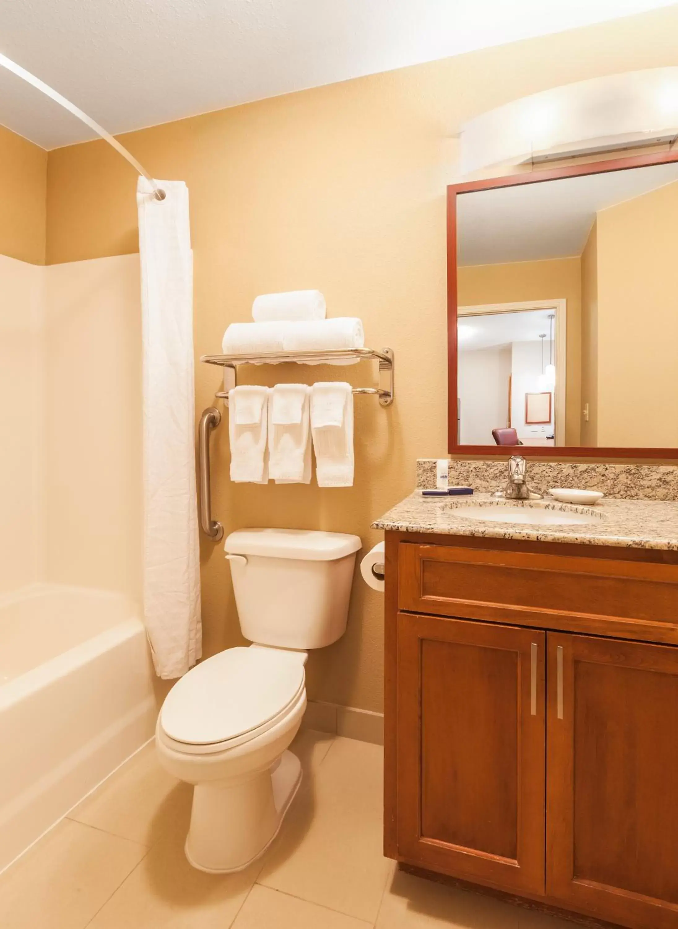 Bedroom, Bathroom in Candlewood Suites Houston I-10 East, an IHG Hotel