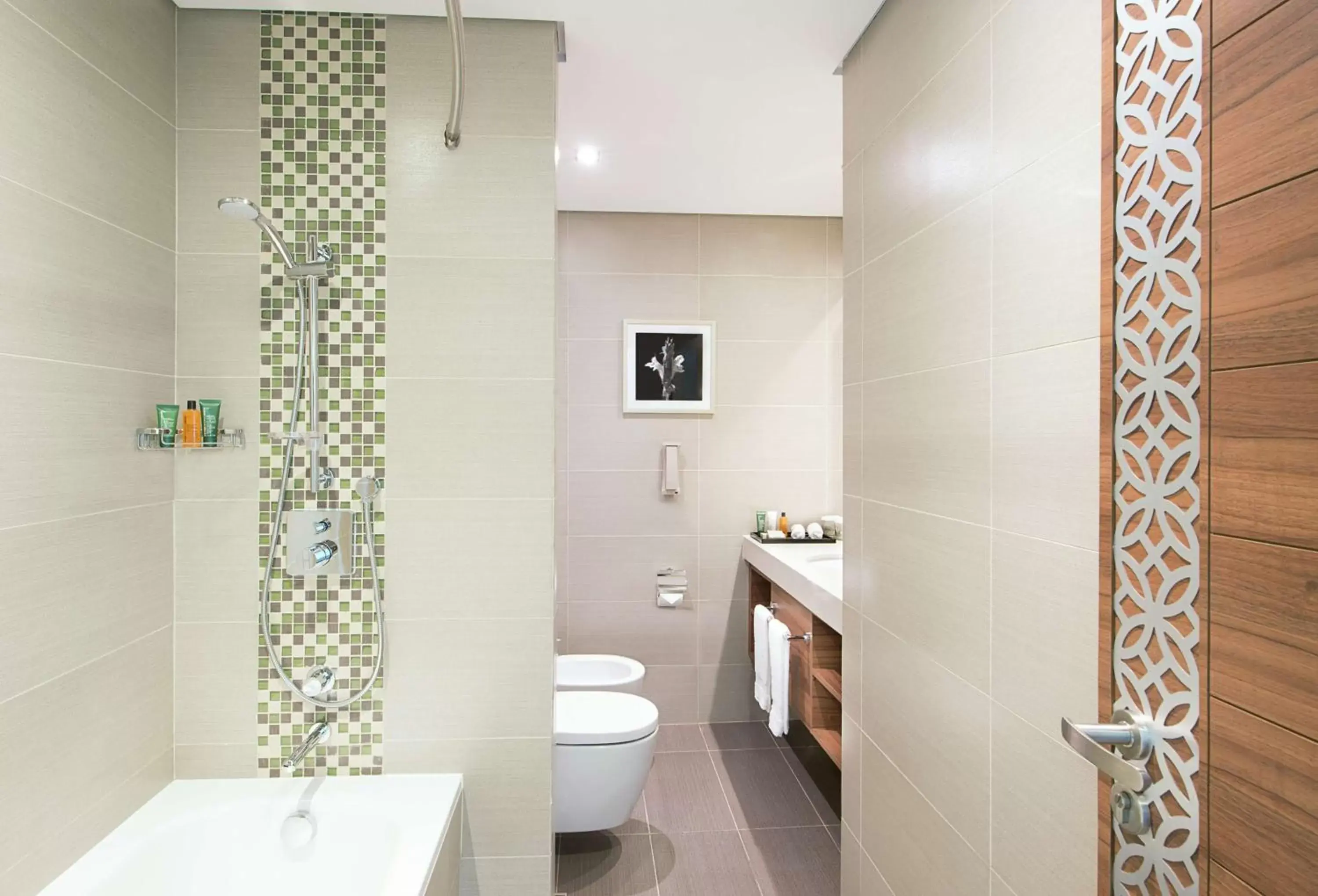 Bathroom in Hilton Garden Inn Dubai Al Muraqabat - Deira