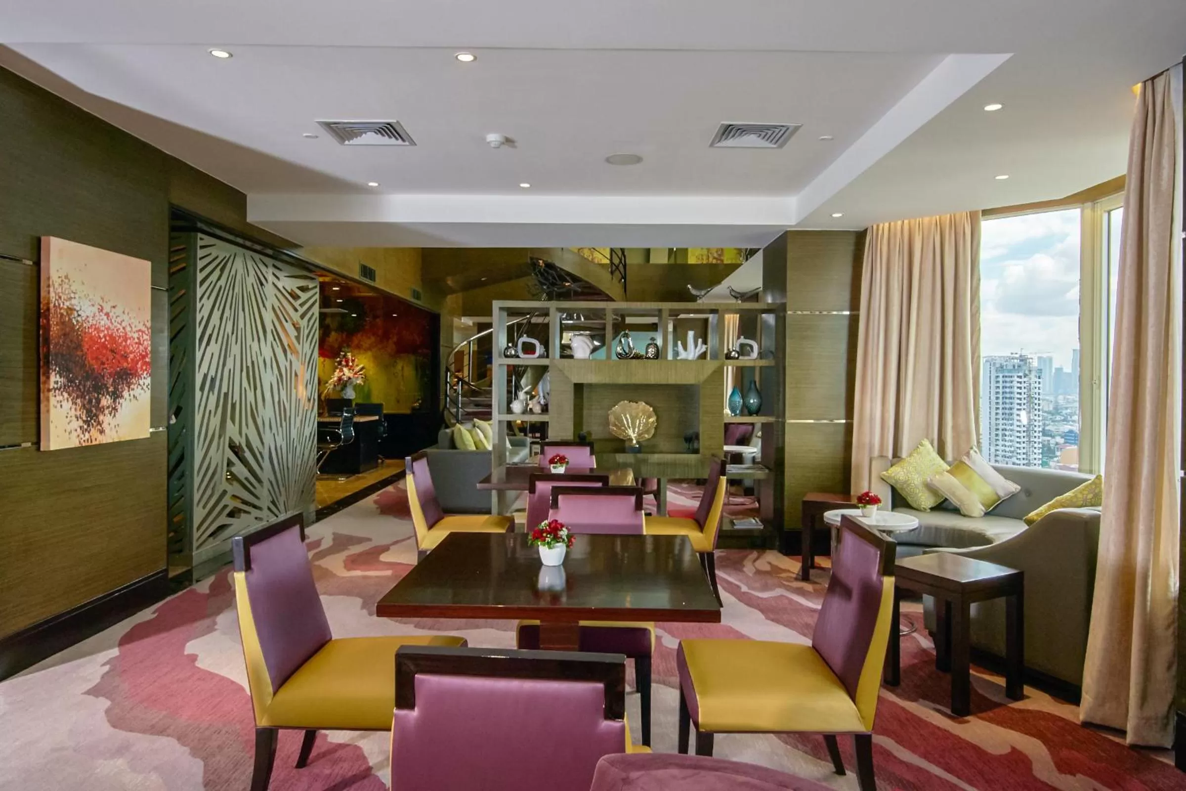 Communal lounge/ TV room in Diamond Hotel Philippines