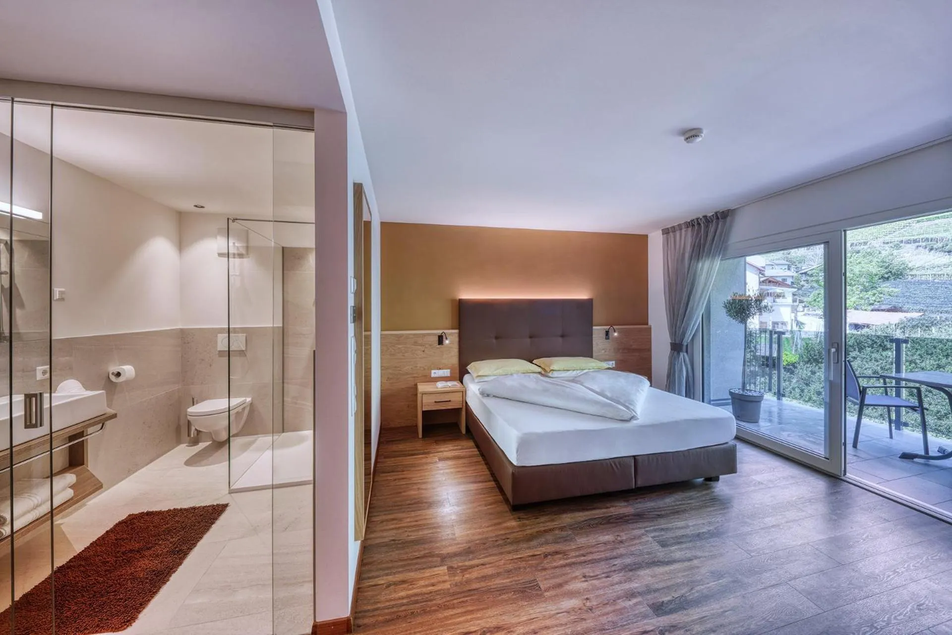 Bed in Das Mitterplarser Hotel