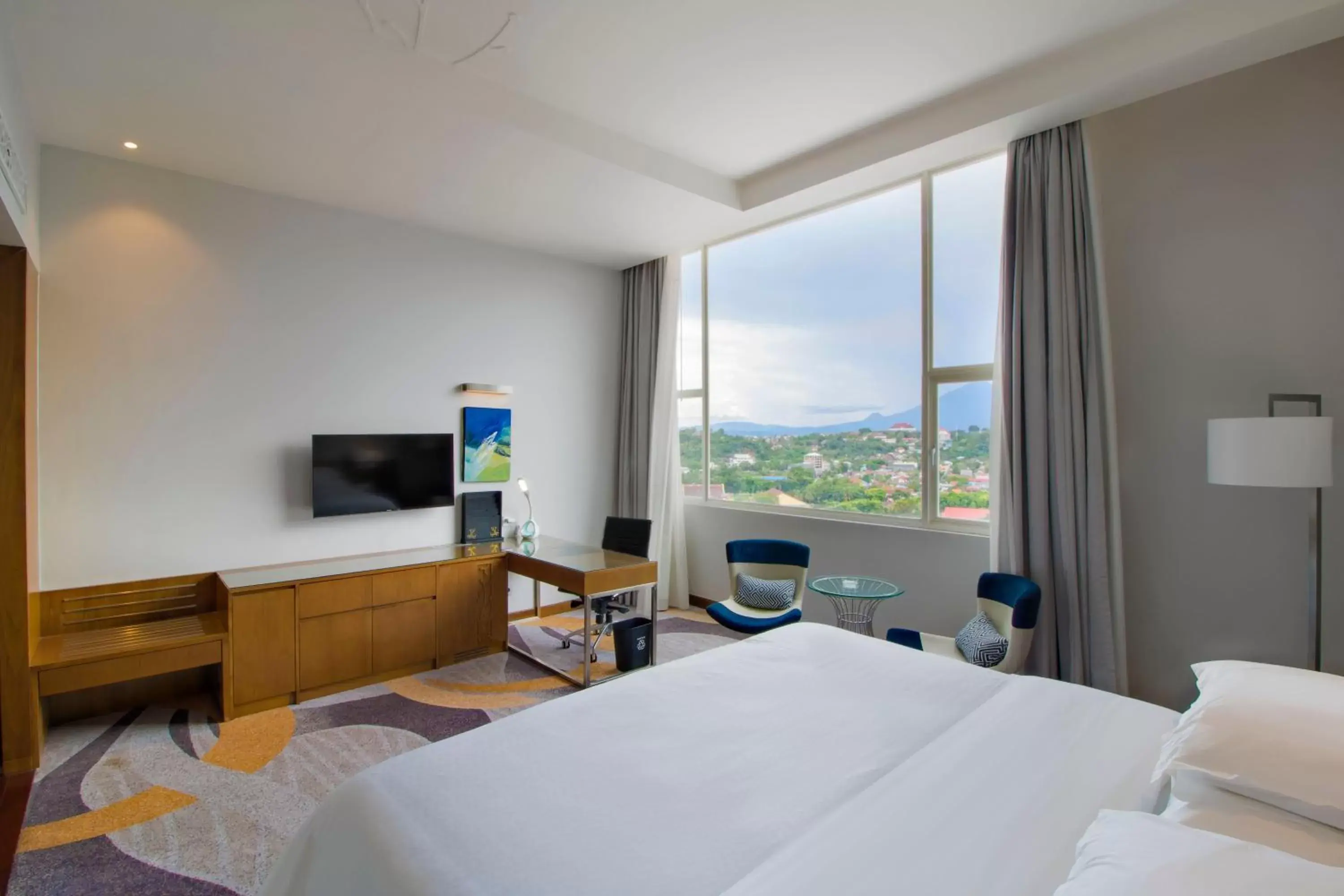 Bed, Mountain View in Four Points by Sheraton Manado