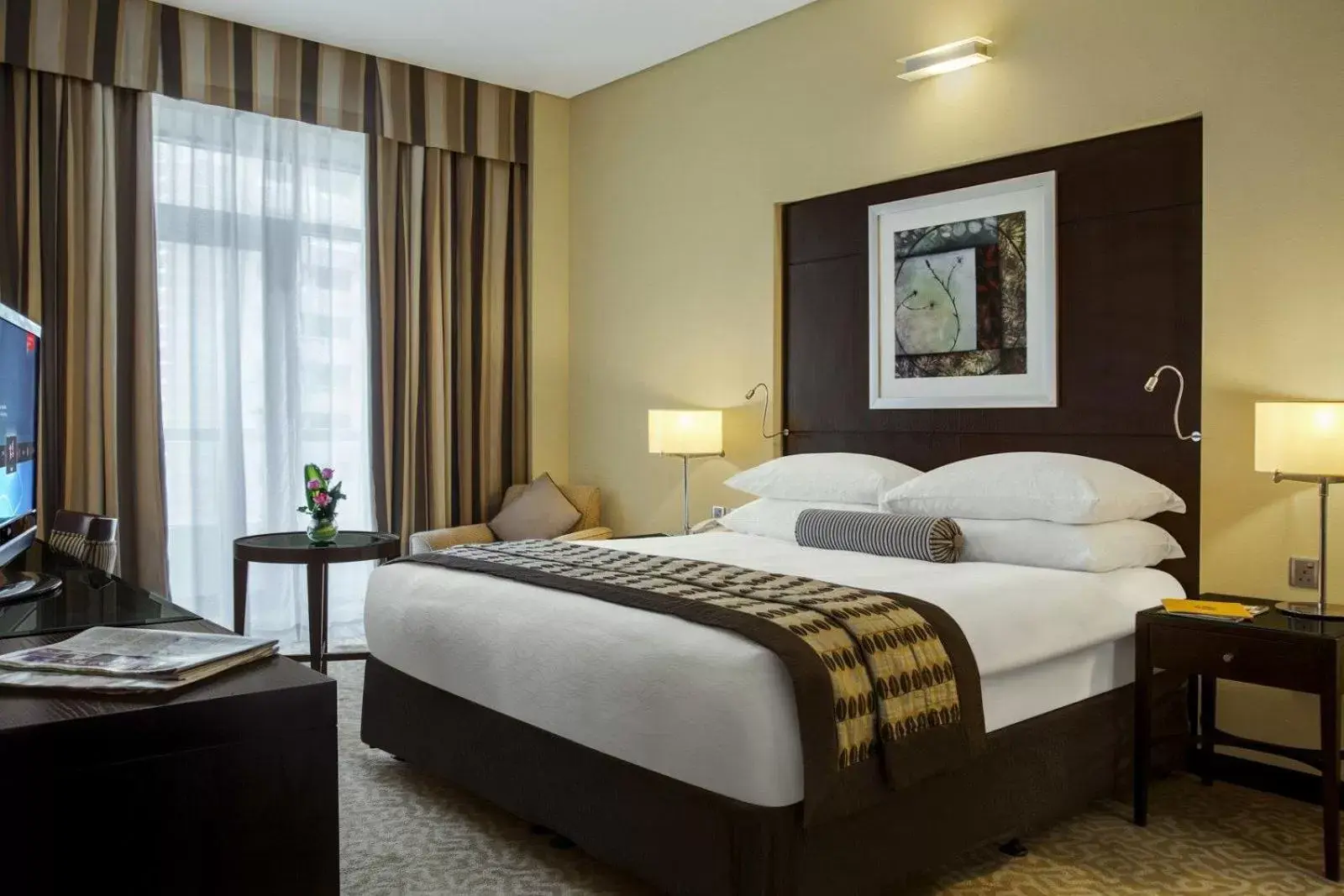 Bed in TIME Oak Hotel & Suites