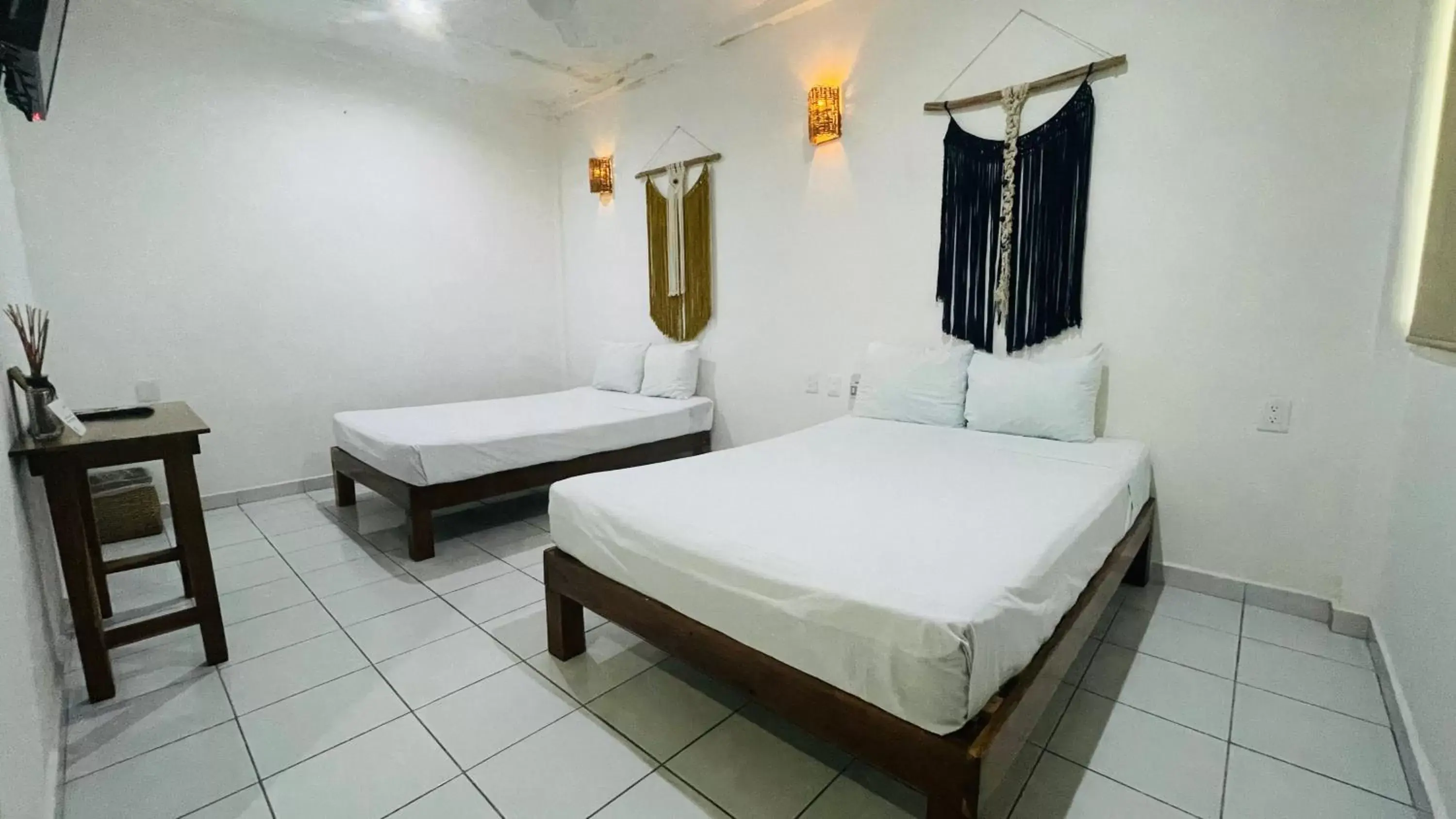 Photo of the whole room, Bed in Los Arcos Hotel - TULUM