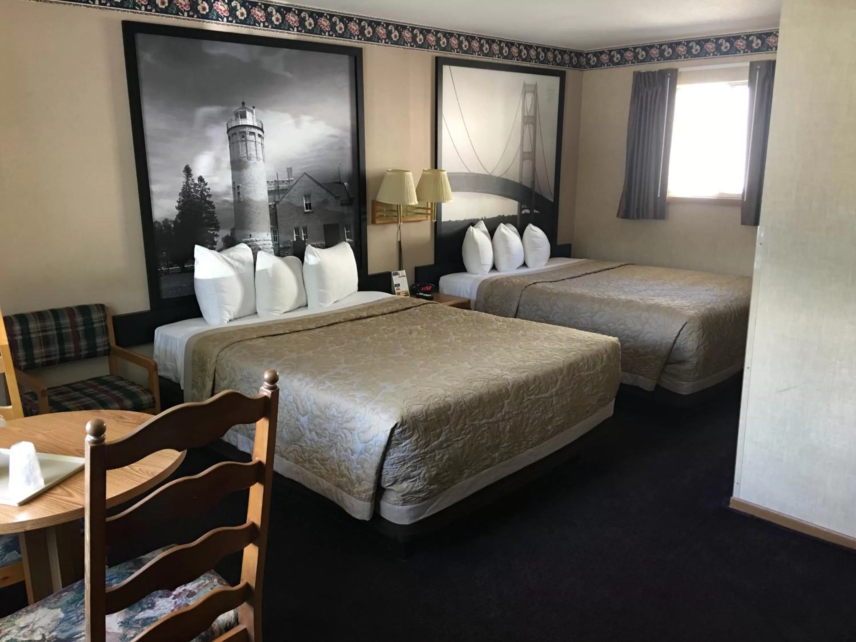Photo of the whole room, Bed in Super 8 Beachfront by Wyndham Mackinaw City, MI