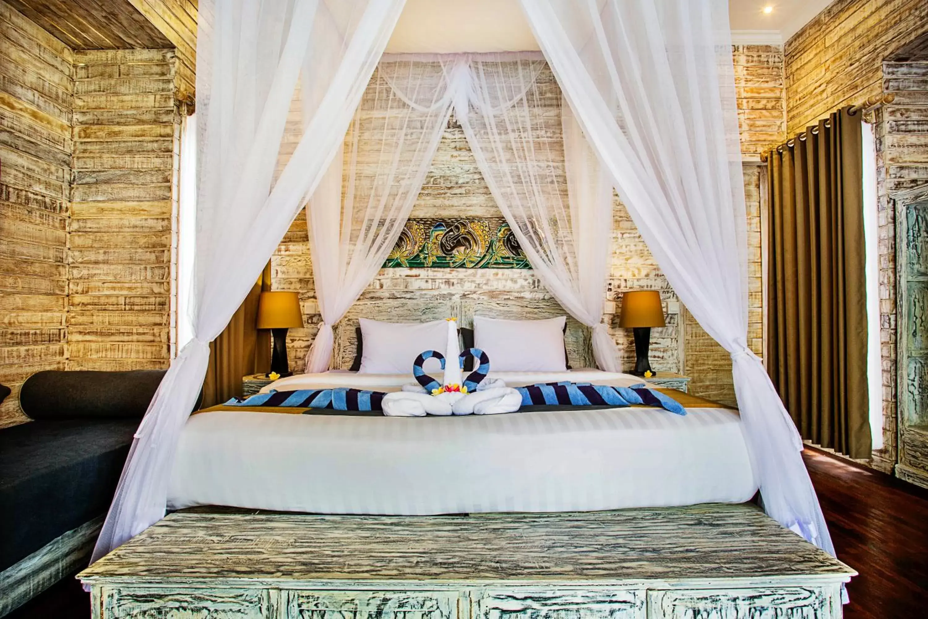 Bed in The Palm Grove Villas