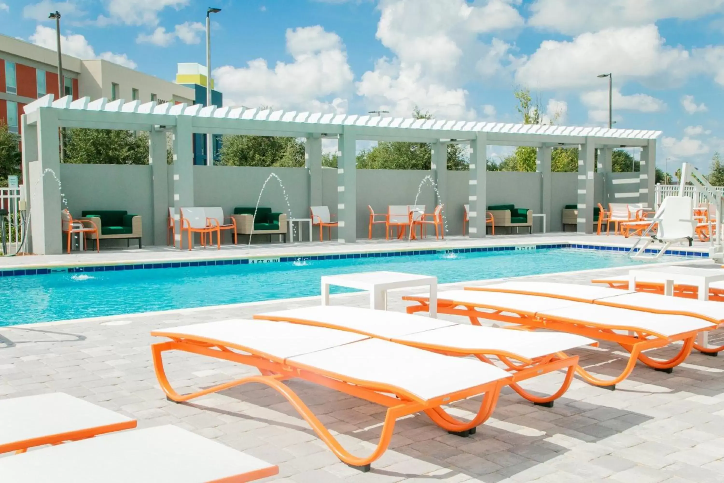 Swimming Pool in Holiday Inn & Suites Orlando - International Dr S, an IHG Hotel